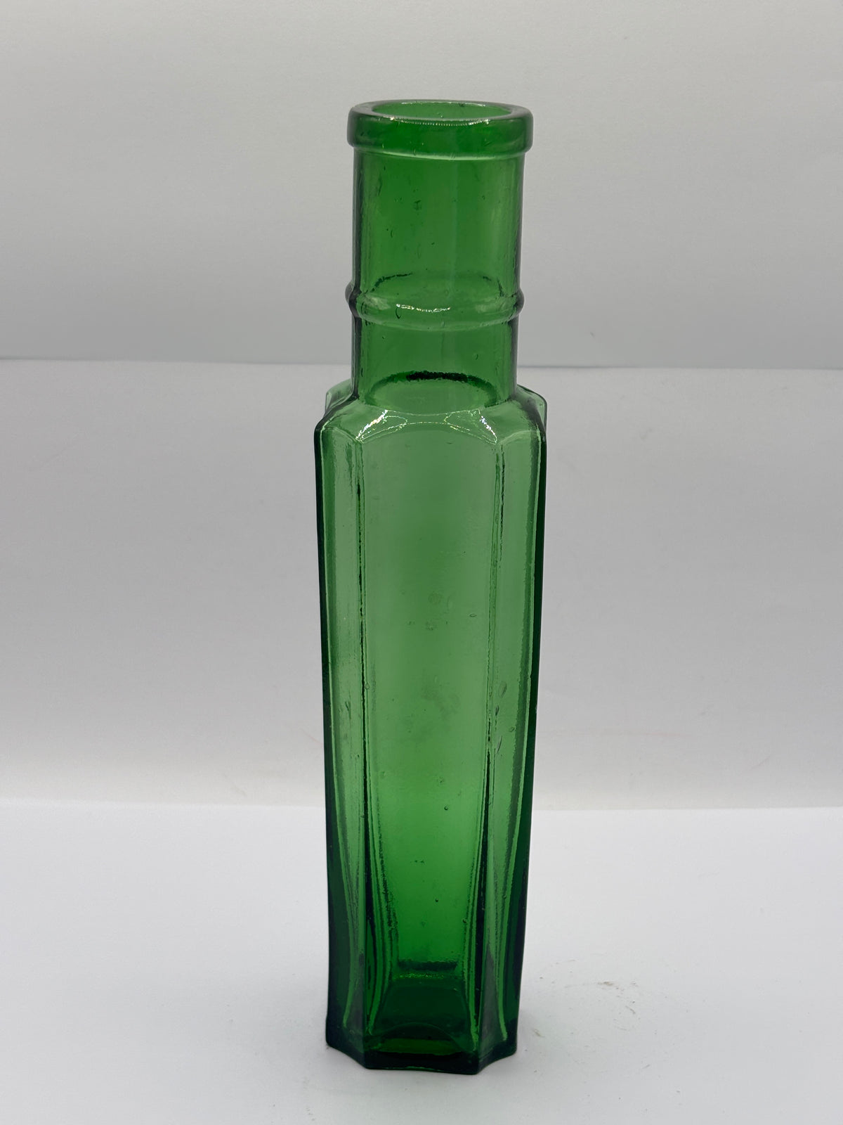old tall green glass bottle 21cms
