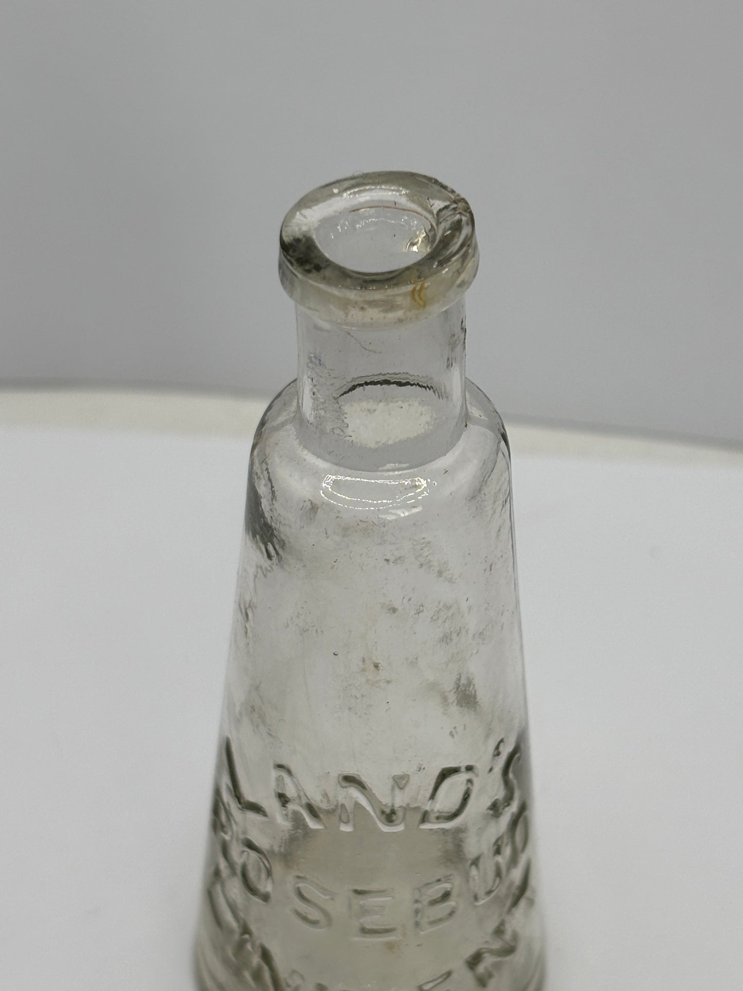 Old Land’s Rosebud liniment bottle