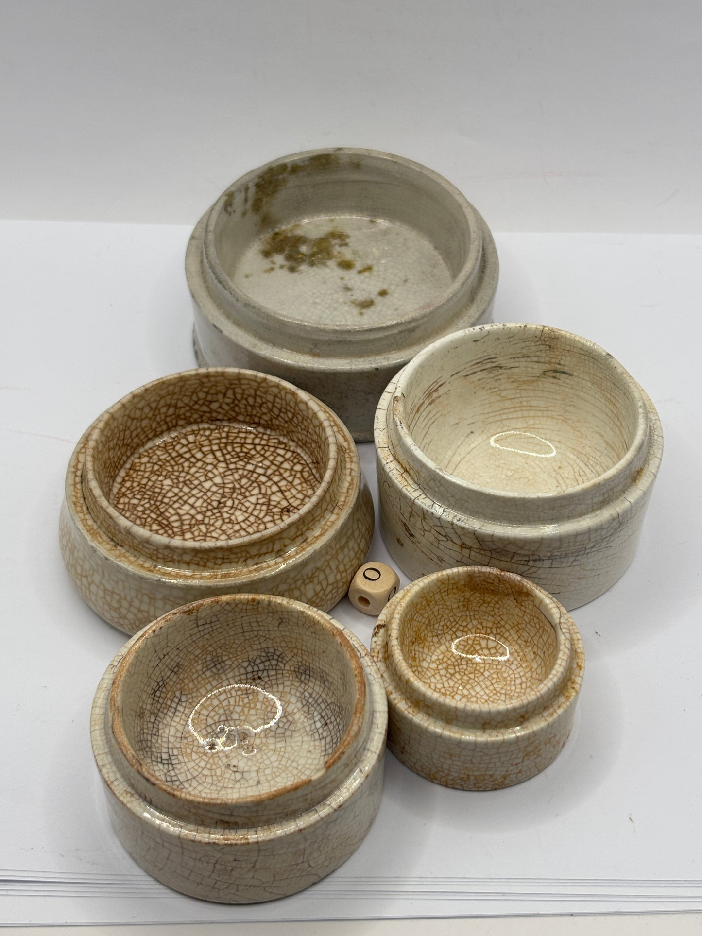 5 old stained & crazed bases, stackers (o) damages