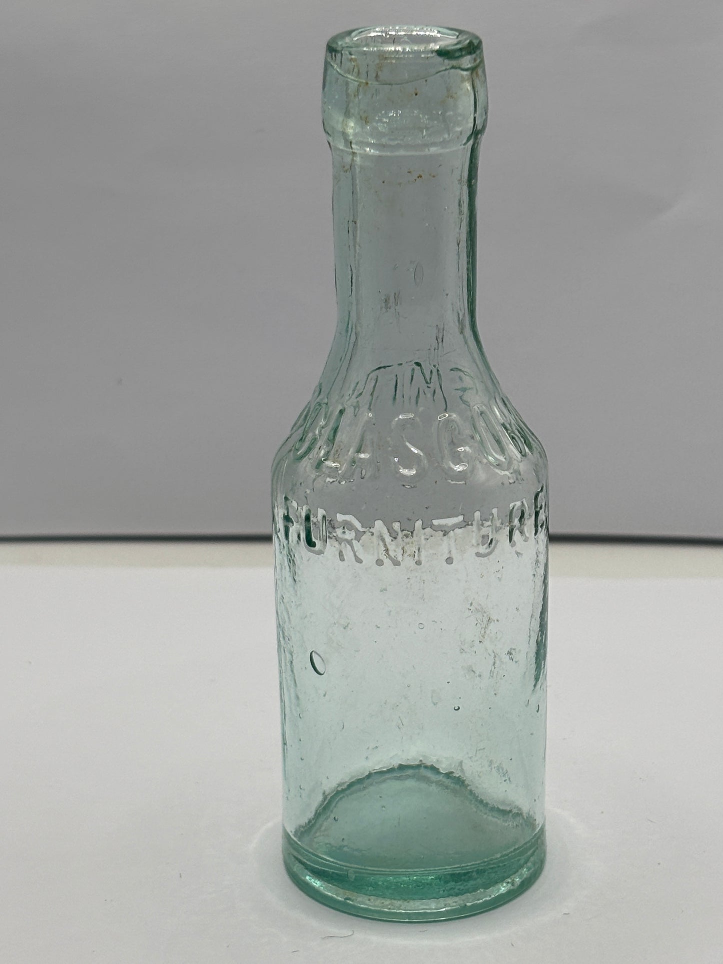Small aqua glass furniture polish. P.Smiths & sons