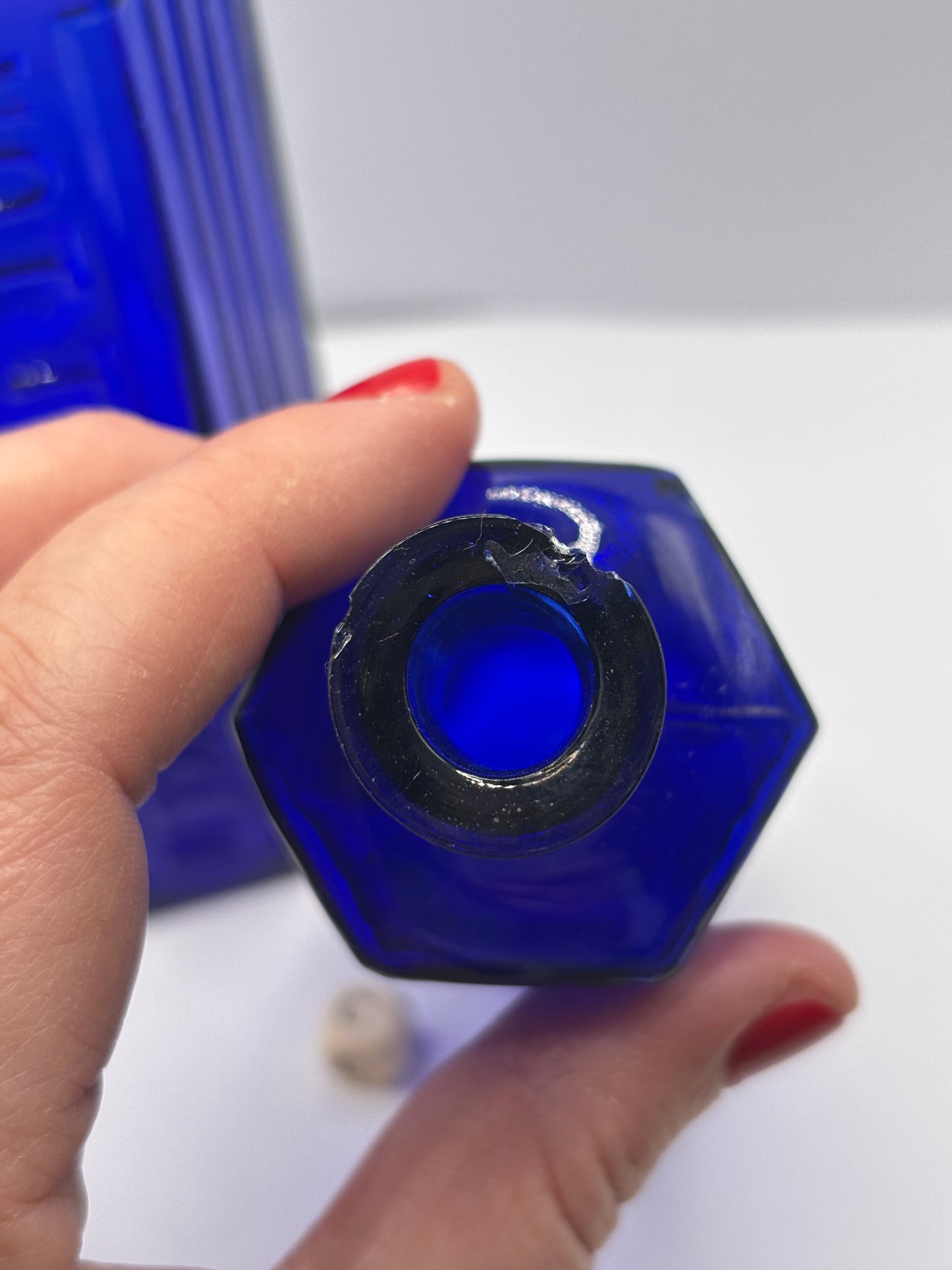 2 Old blue glass ribbed poison bottles. ‘not to be taken’ (C) damaged