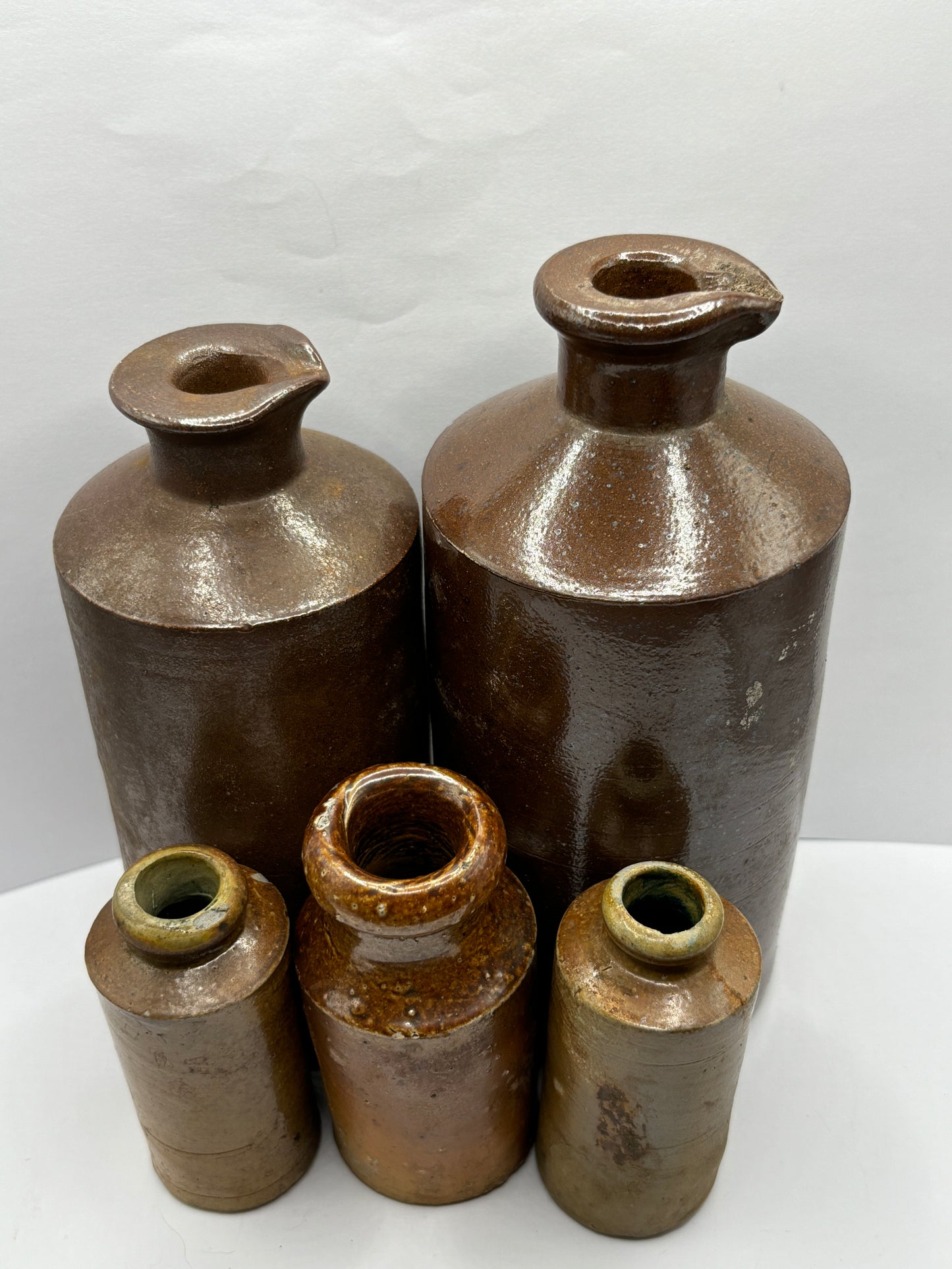 5 old brown stoneware pots