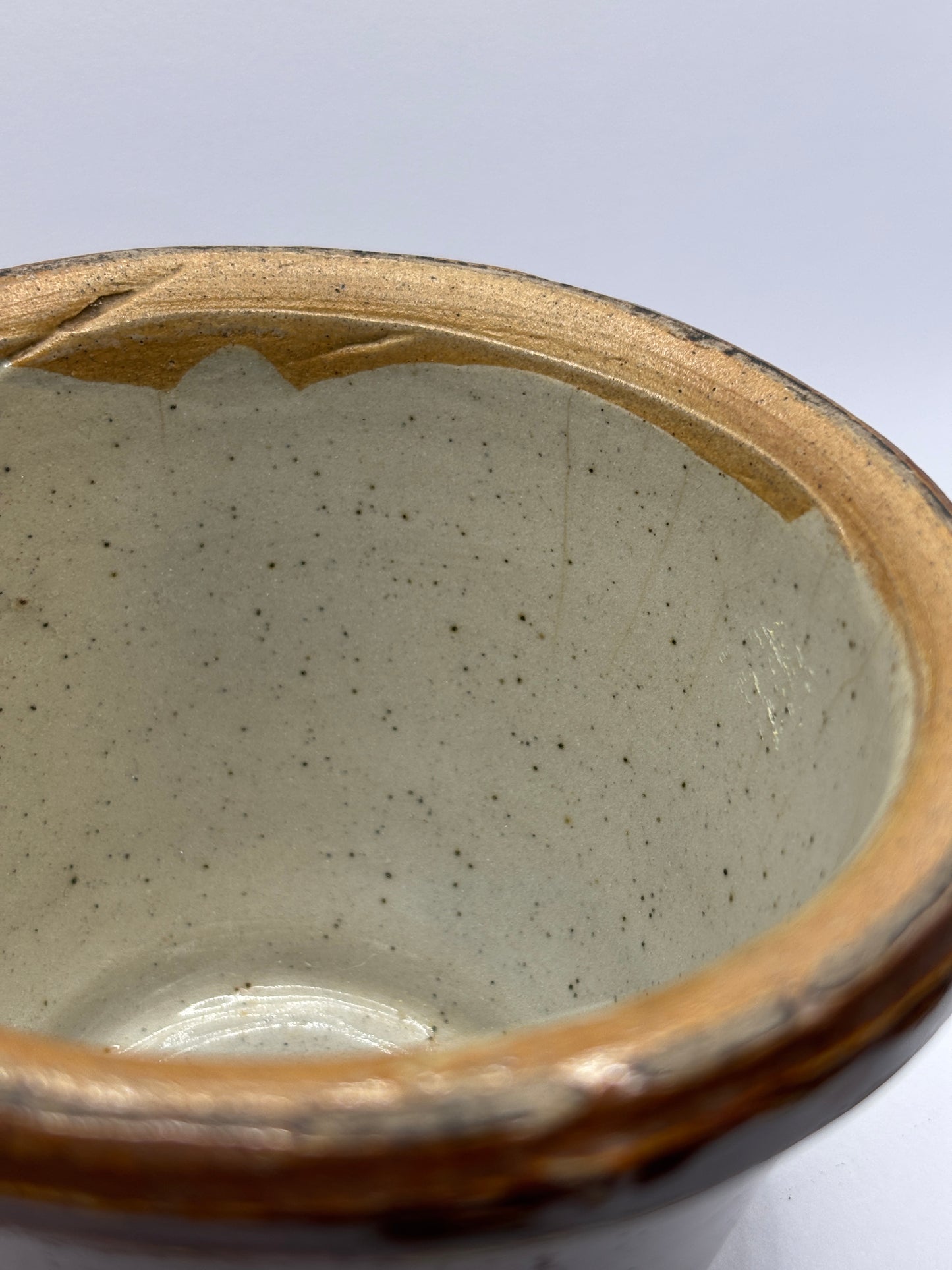 Old small brown stoneware bowl