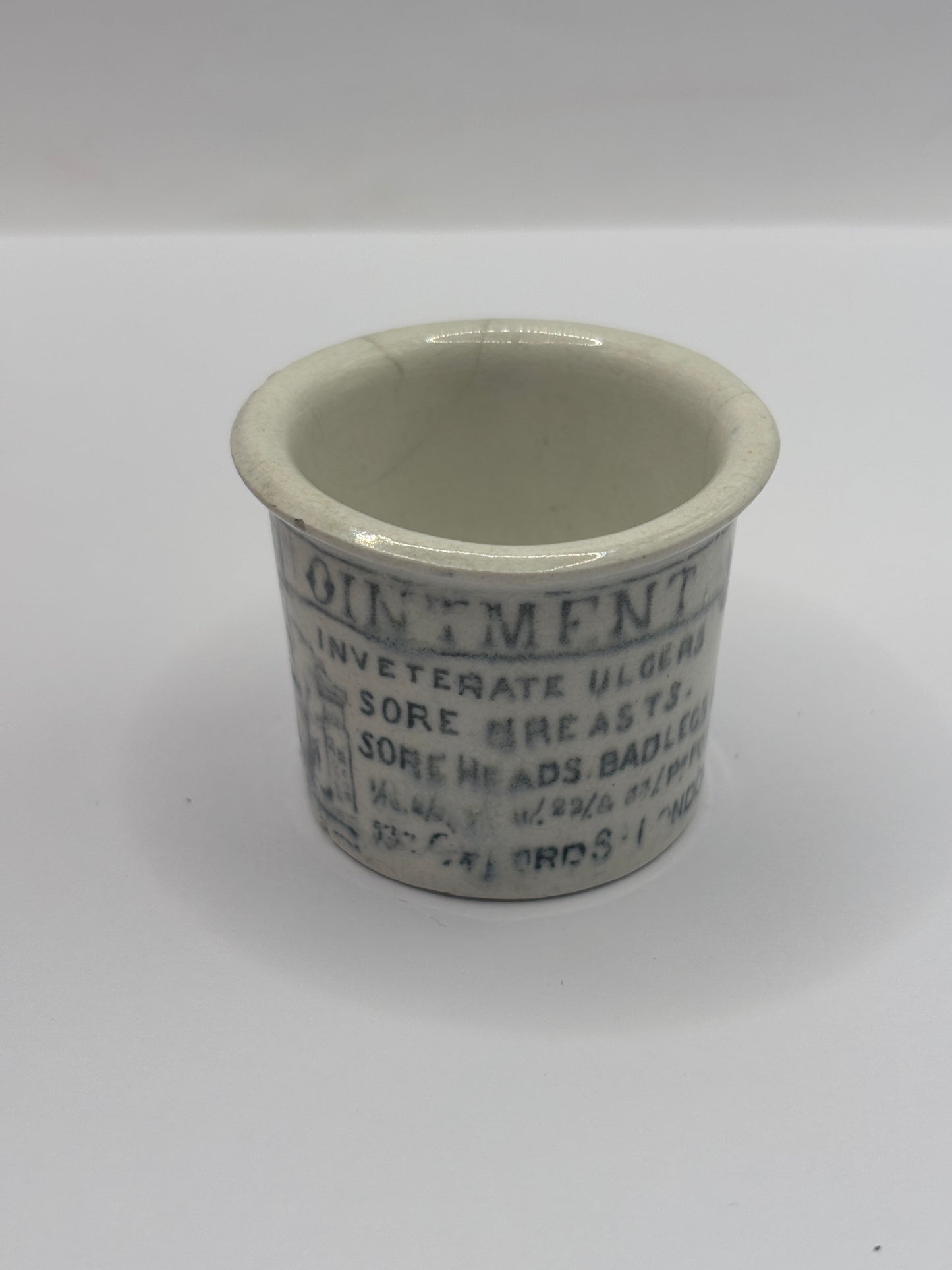 Old advertising ointment pot, Holloways ointment. Hairlined