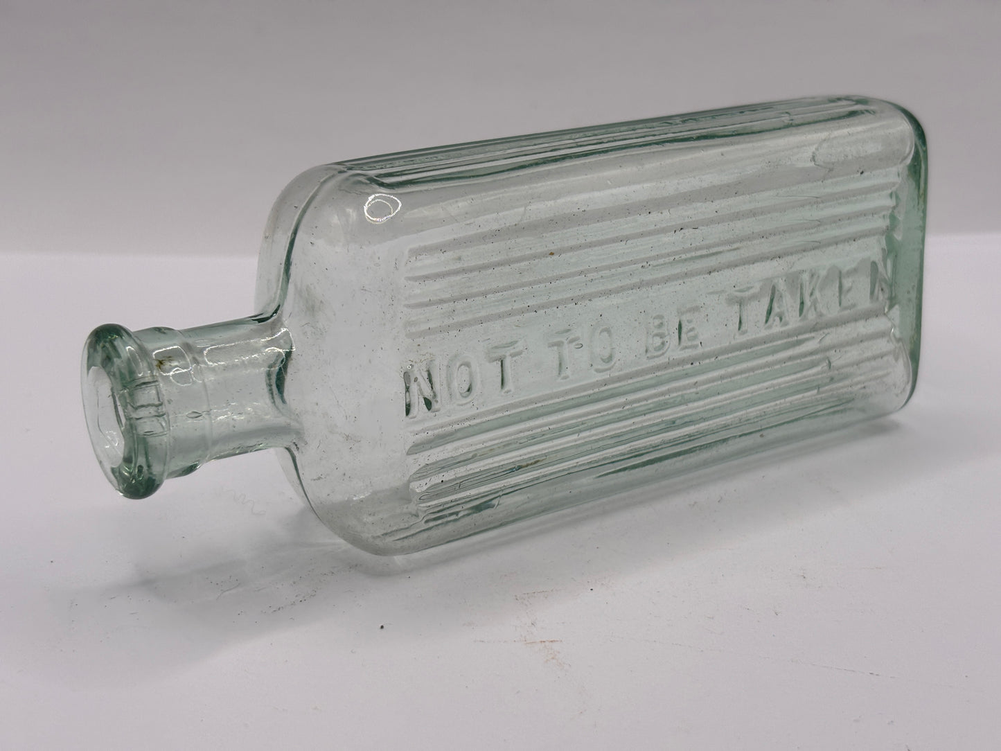 Old aqua glass poison bottle, not to be taken (Copy)