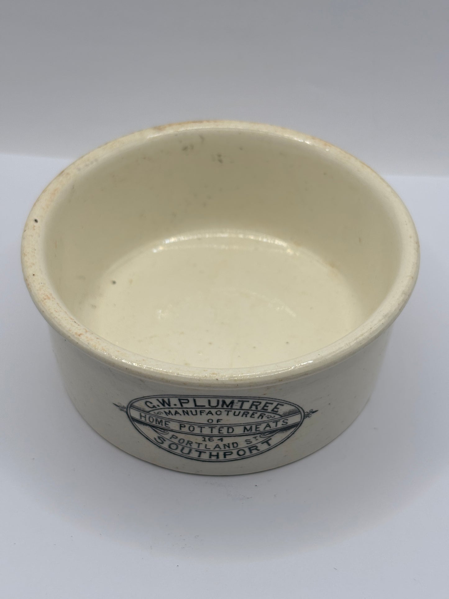 Old XL advertising meat paste pot, Plumtrees