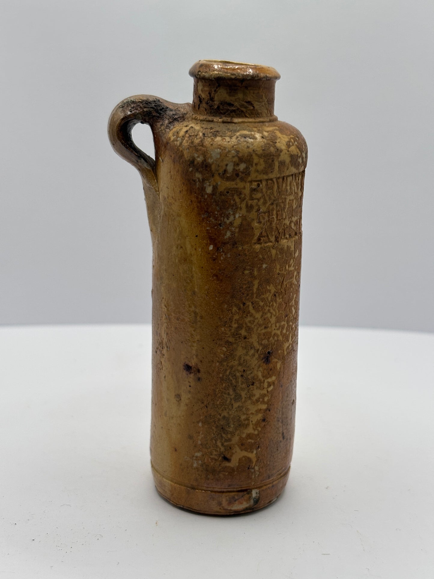 Old mini stoneware apollinaris bottle 10.5cms