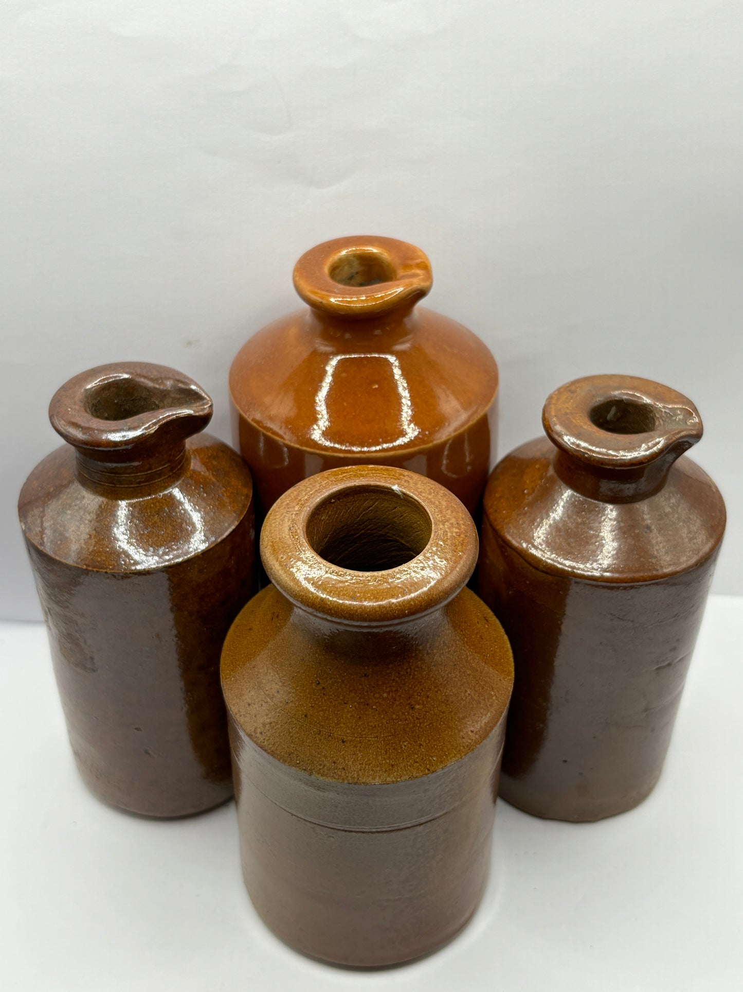 4 old brown stoneware pots