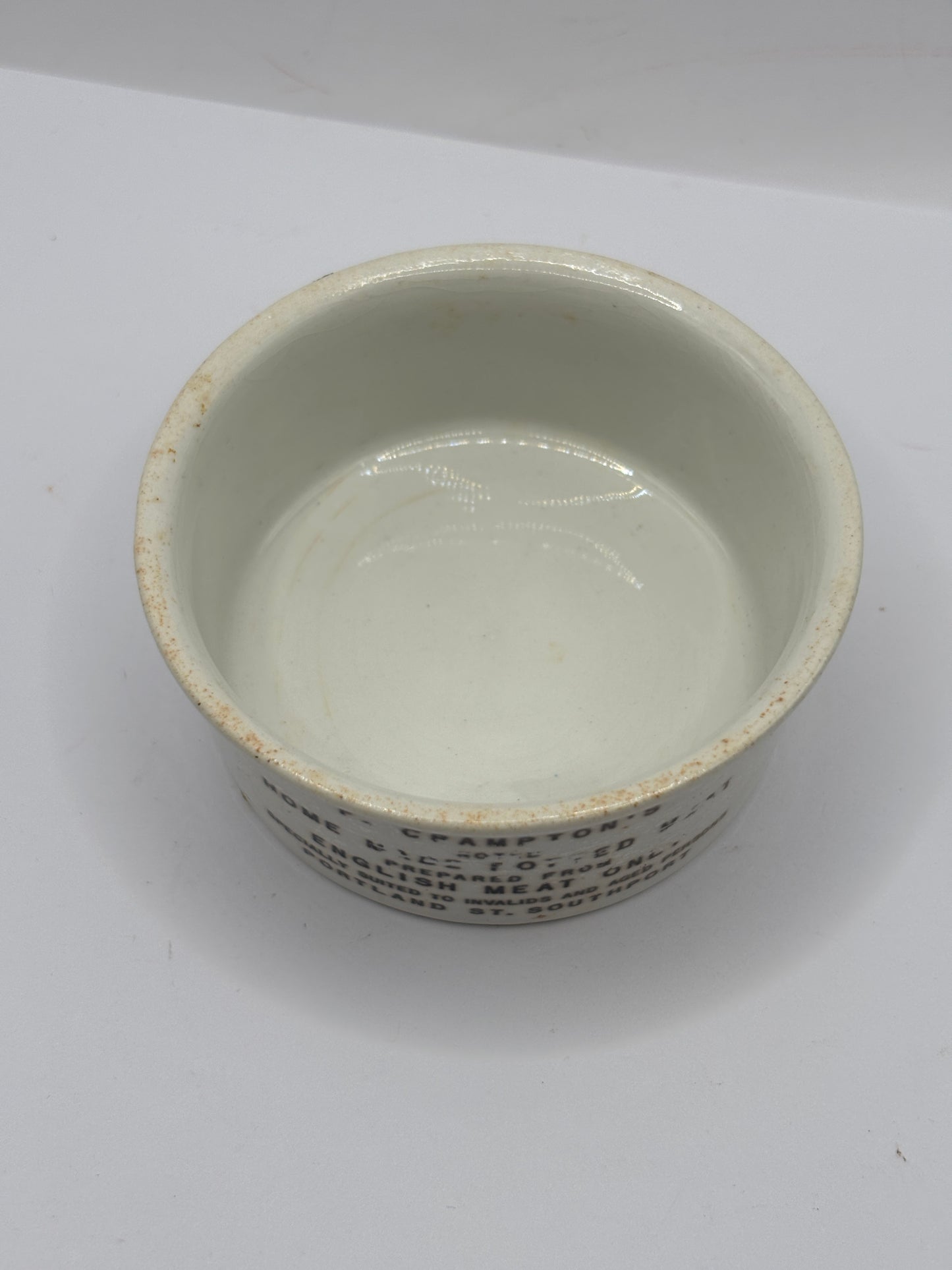 Old advertising meat paste pot. Black print, Cramptons