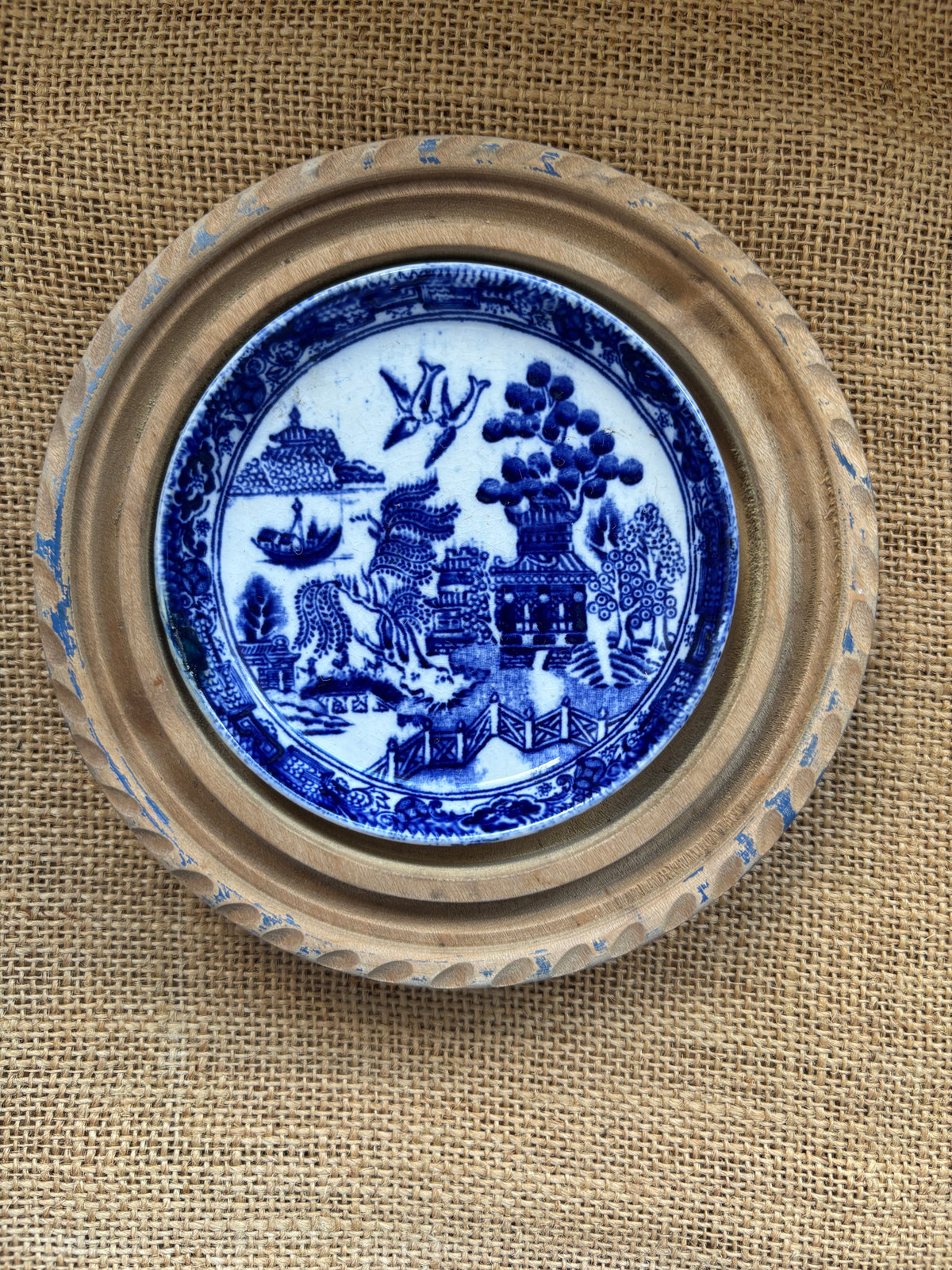 Old wooden butter dish with willow pattern