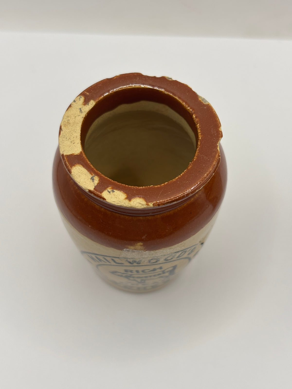 Old advertising cream pot, Hailwoods rich cream. Damaged