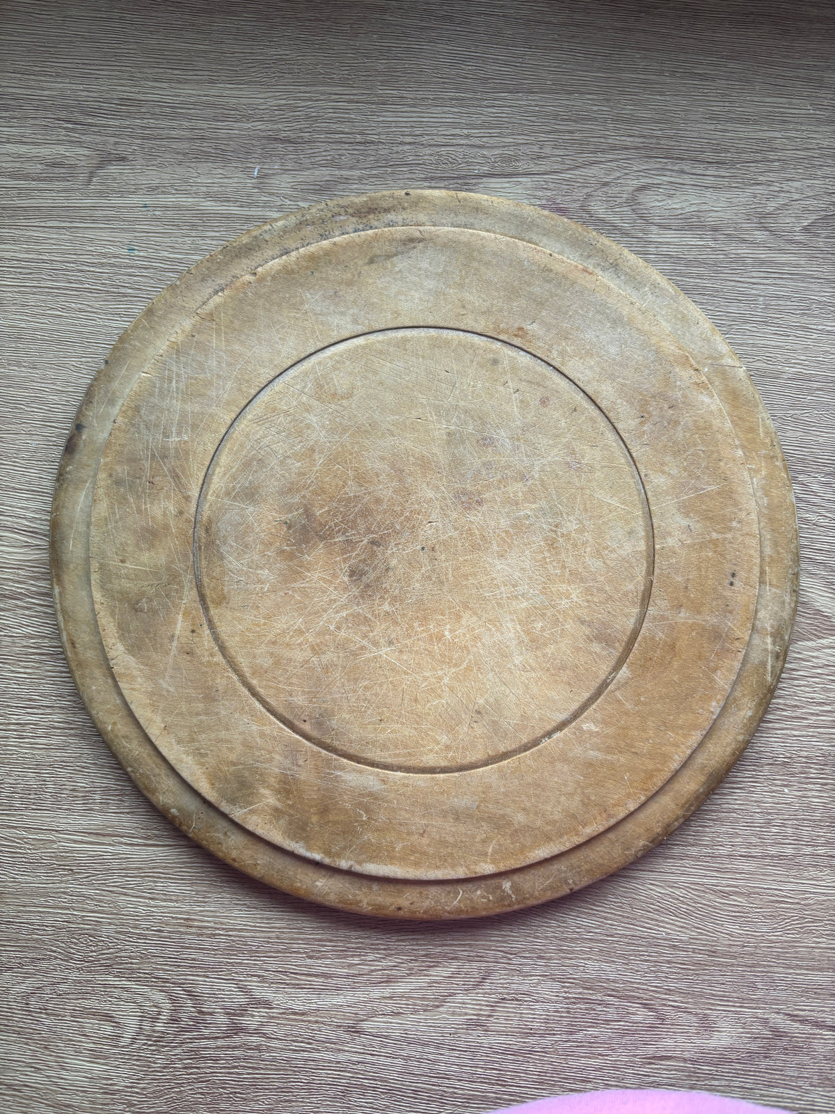 Old wooden carved bread board