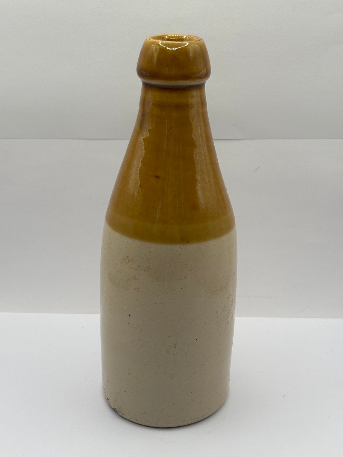 Old stoneware stout bottle, John Mackay & Co