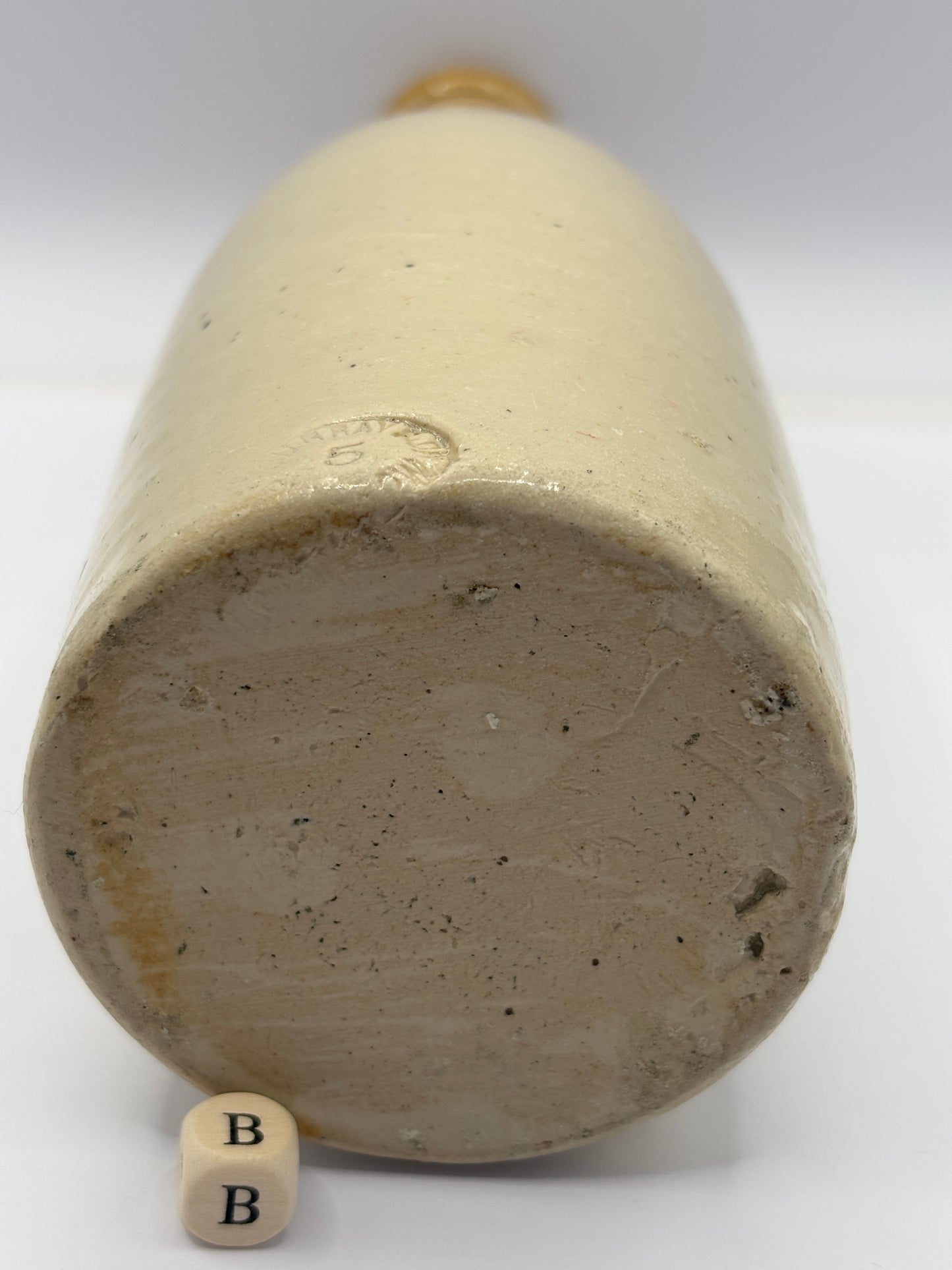Old plain stoneware ginger beer bottle (B)