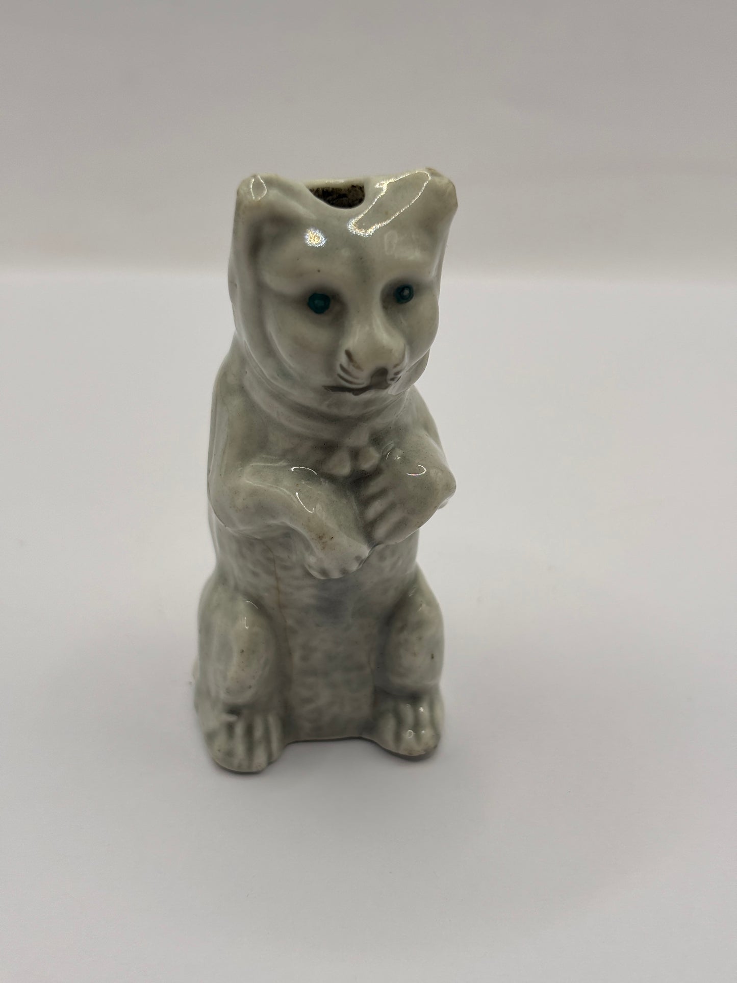 Old stoneware cat decoration