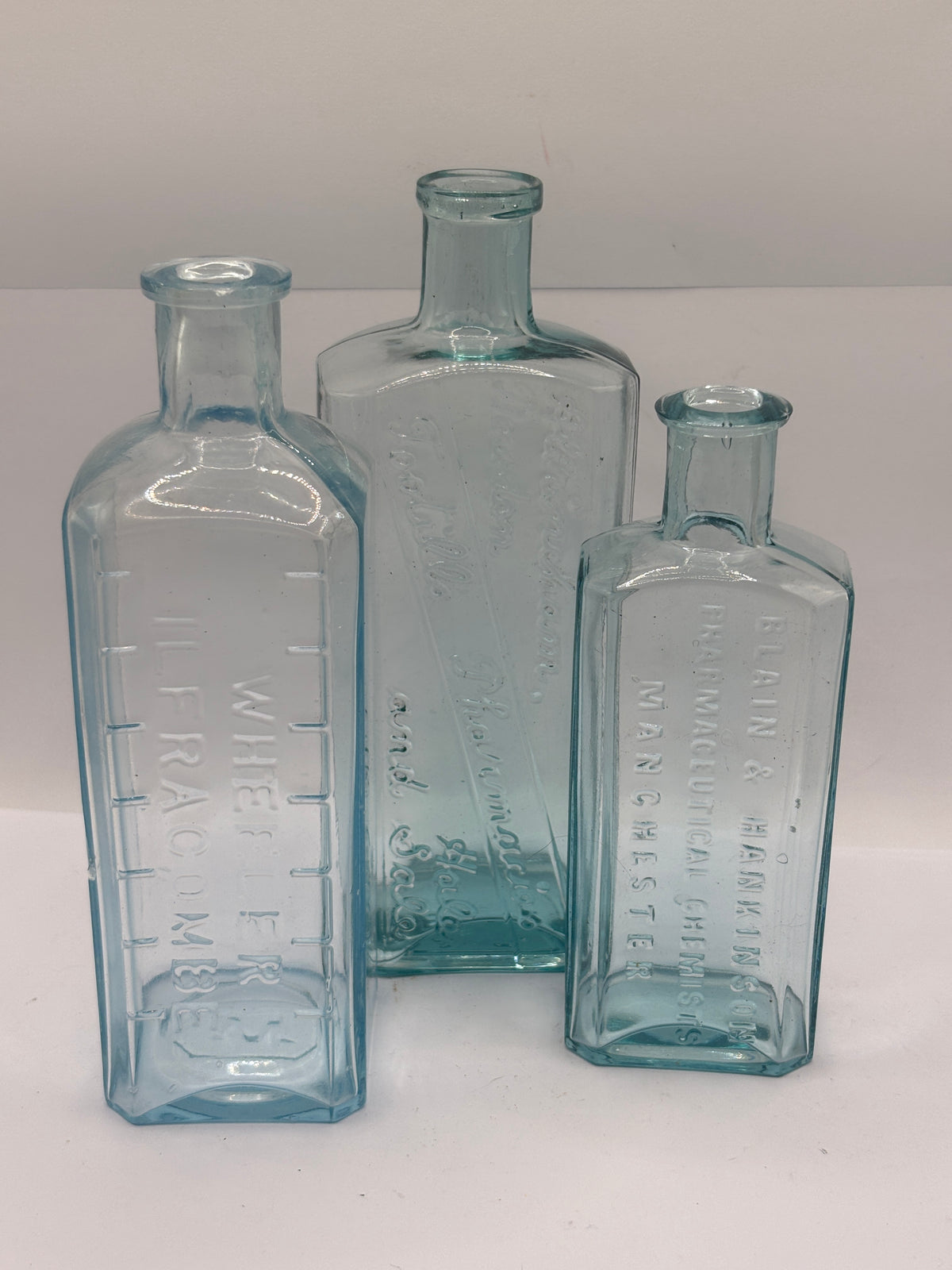 3 old aqua glass advertisement chemist bottles
