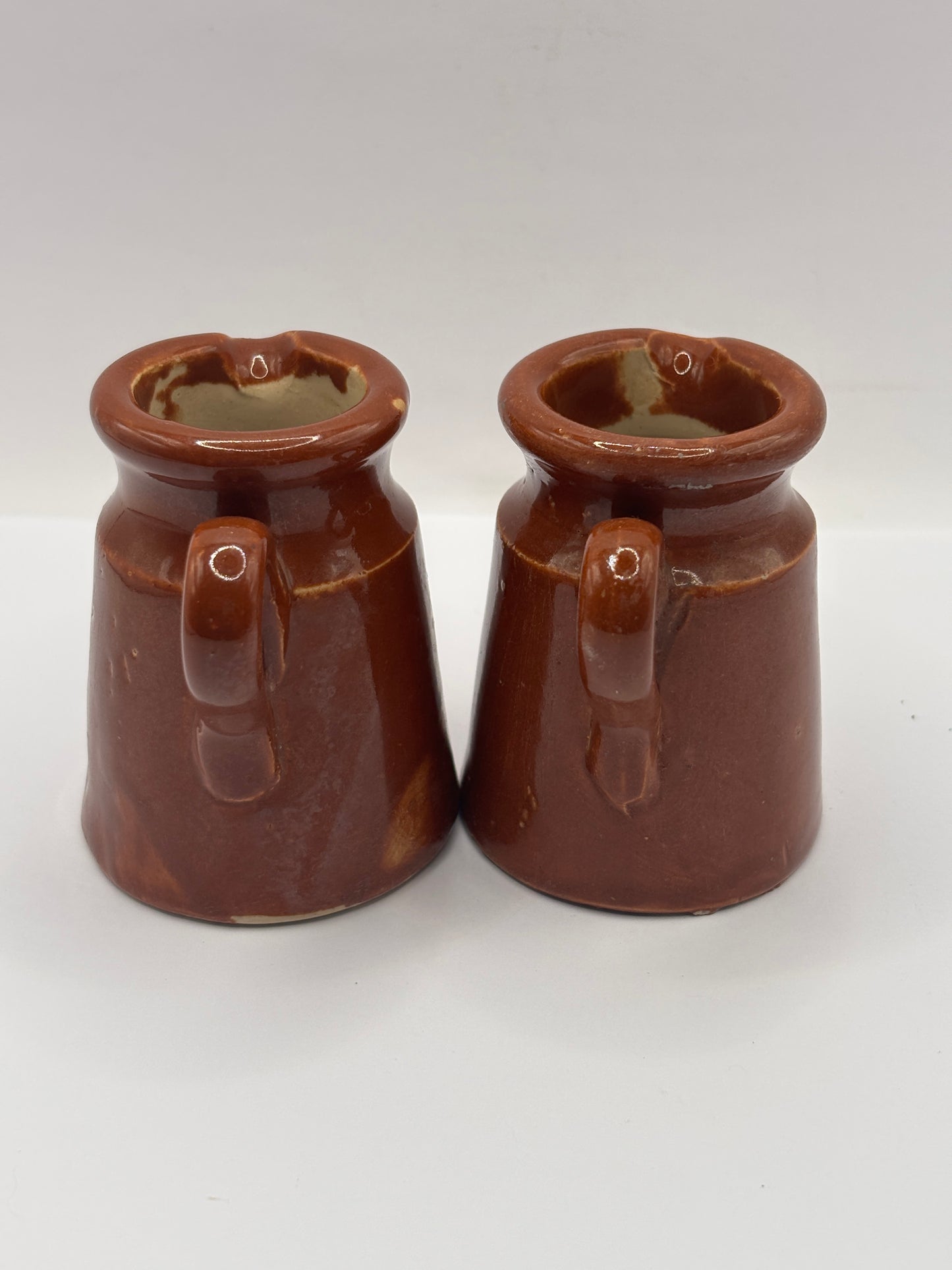 2 old small brown stoneware cream pots, pouring cream