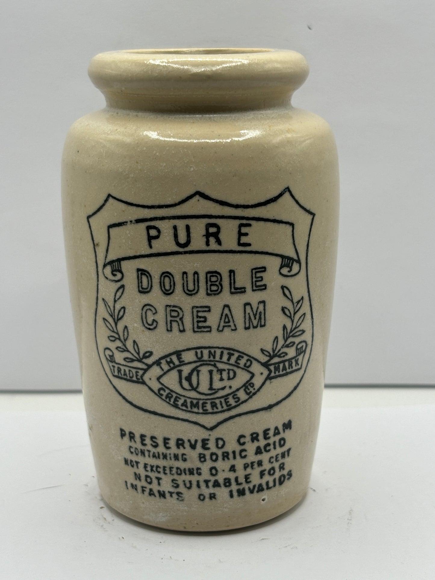 Pure double cream advertising cream pot. The united creameries