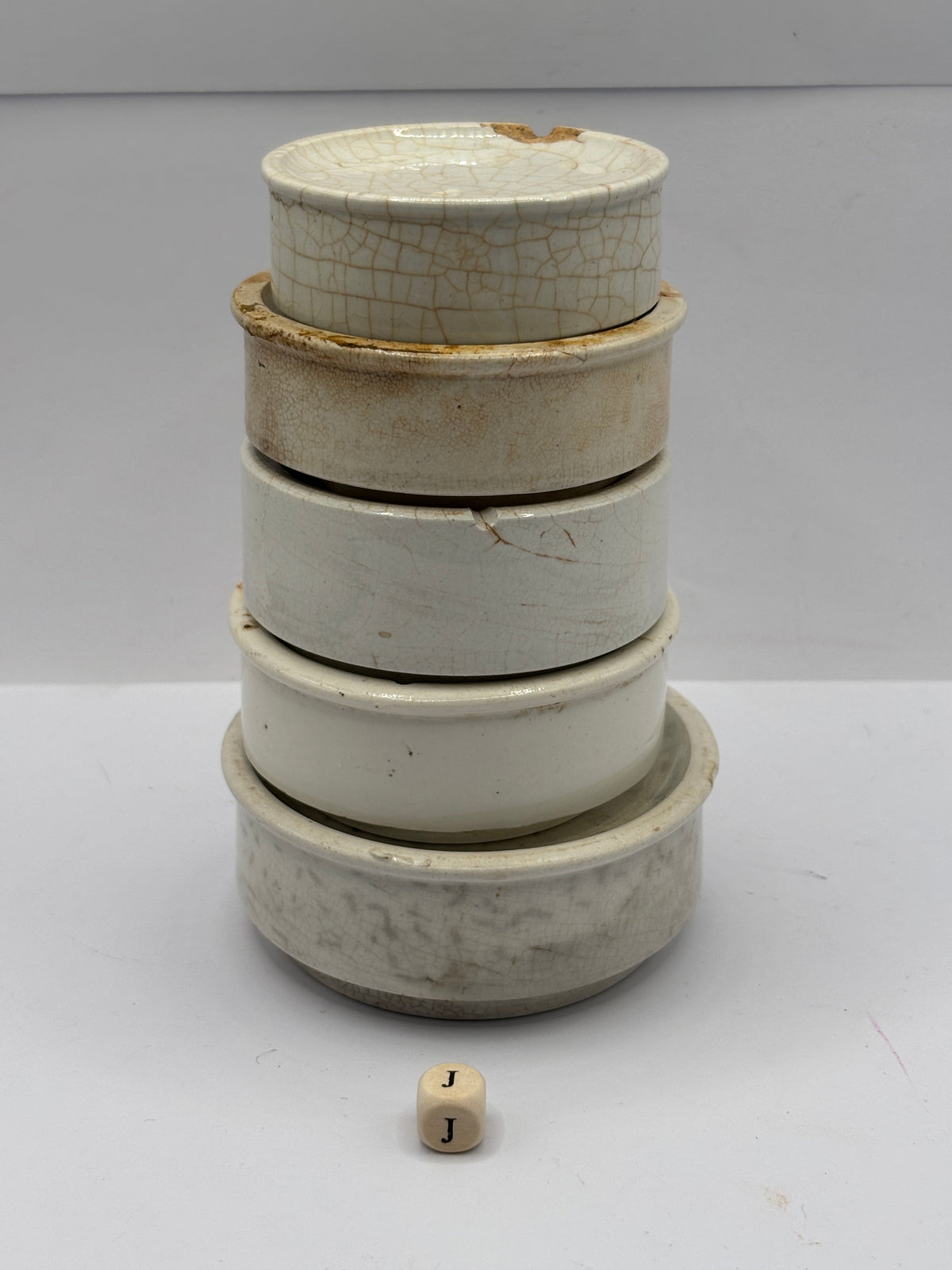 5 old stoneware pot lid bases, stackers (J)