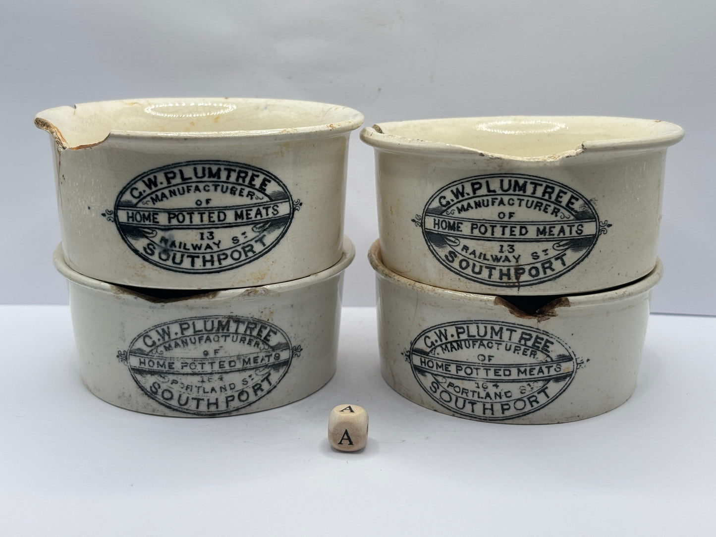 4 old advertising meat paste pots (a) damaged