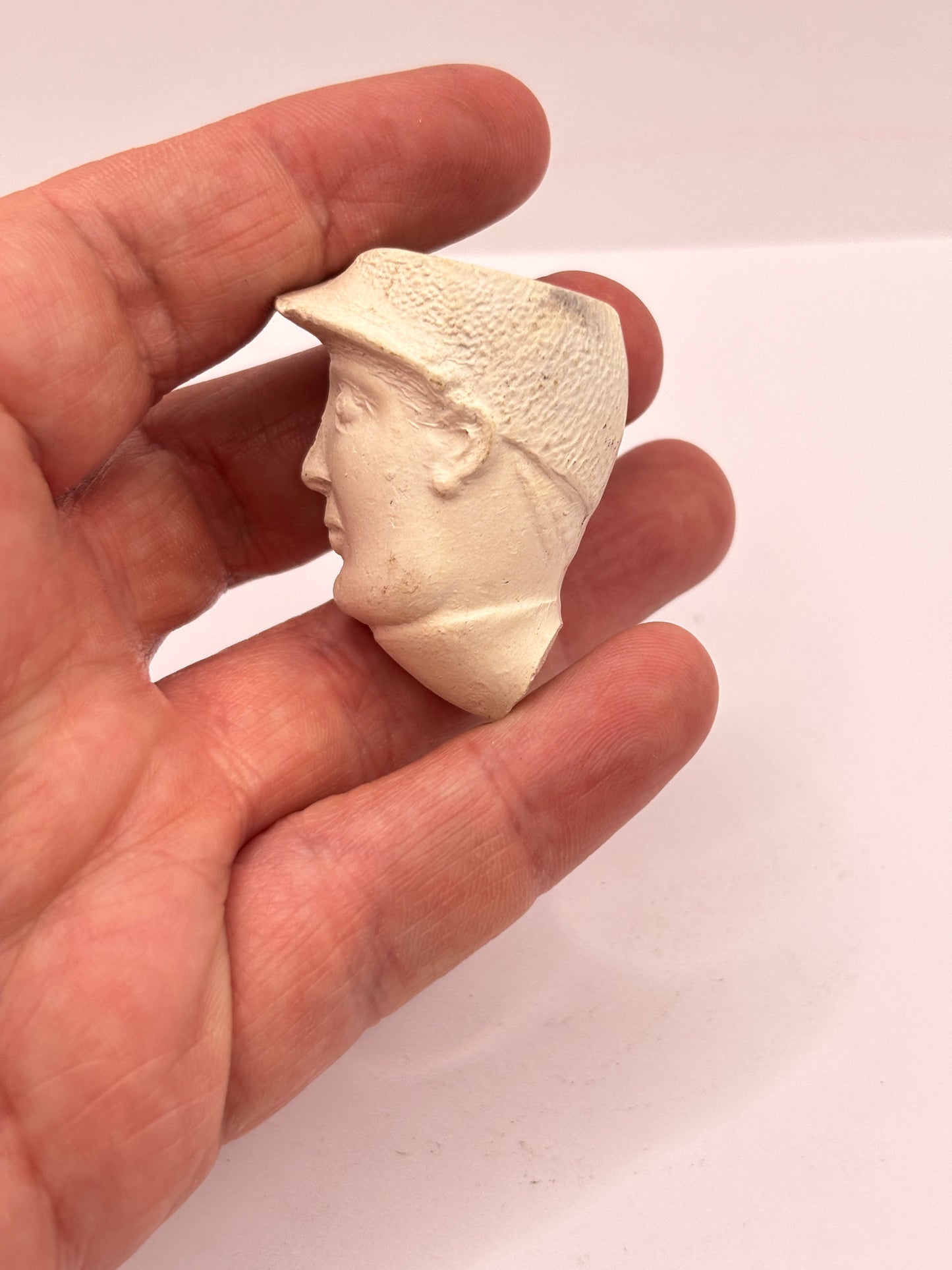 Old figural clay pipe head, pipe bowl