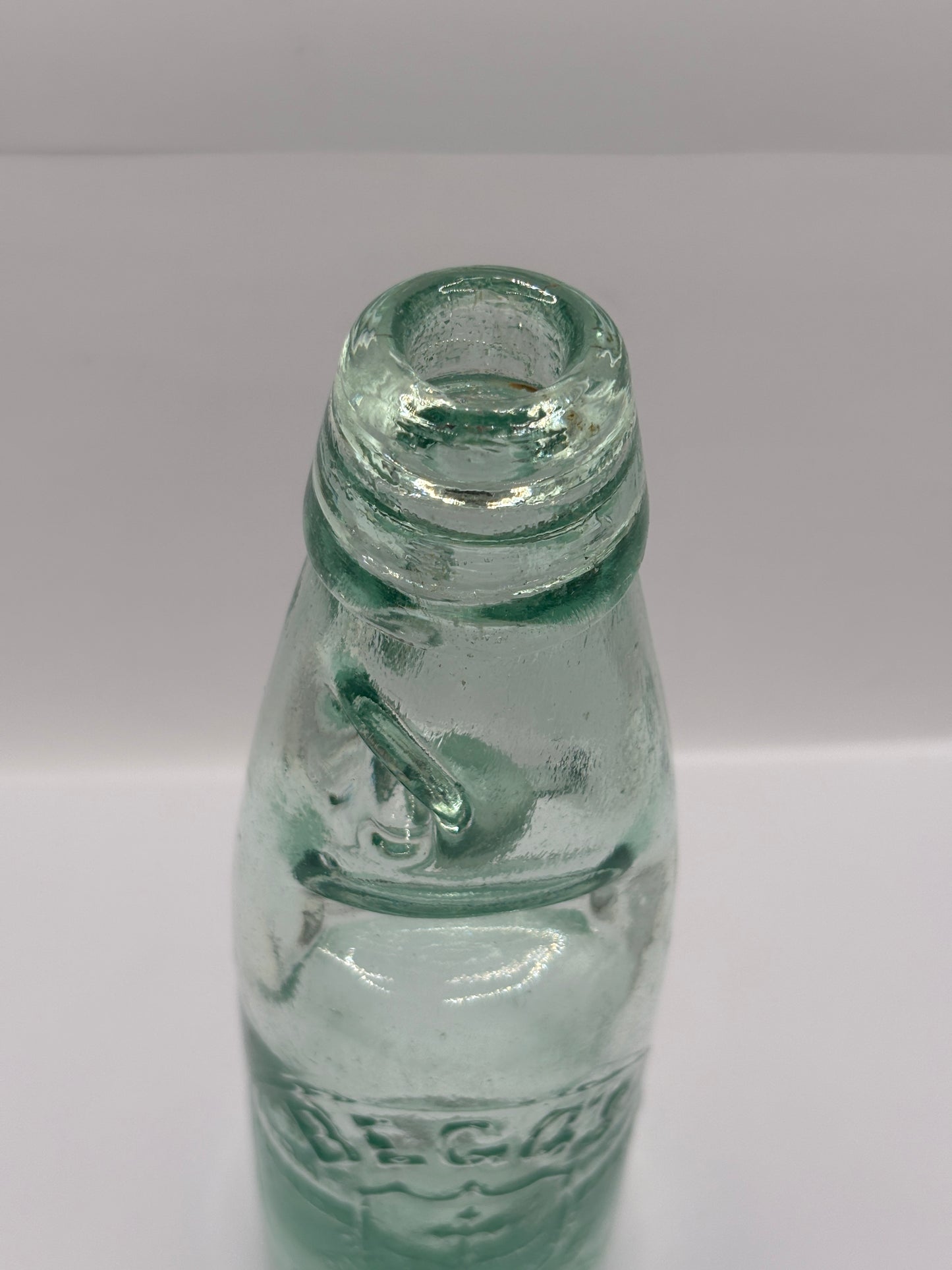 Old Bolton codd bottle, with marble. Begg’s