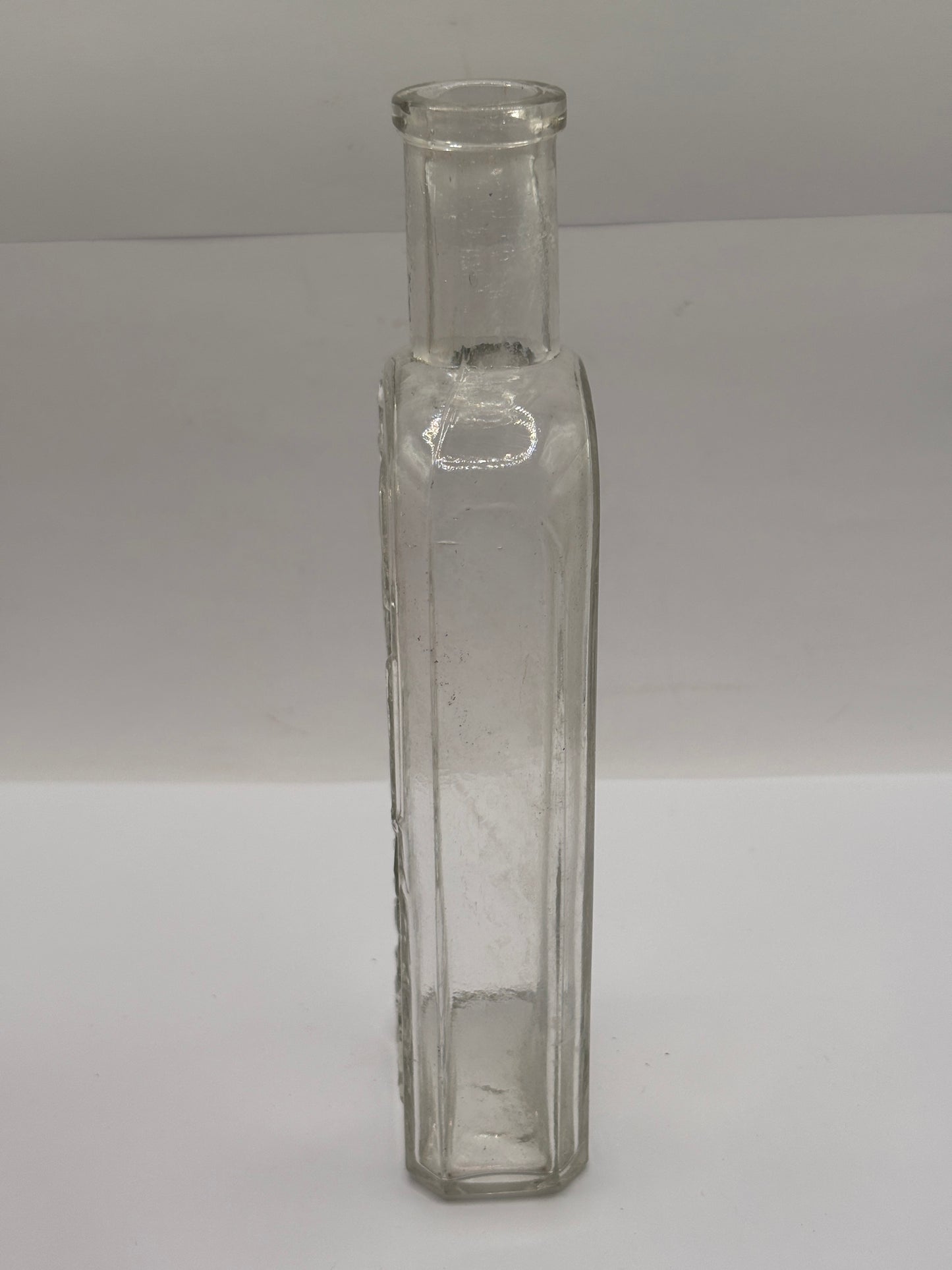 Old clear glass Boots cash chemists bottle