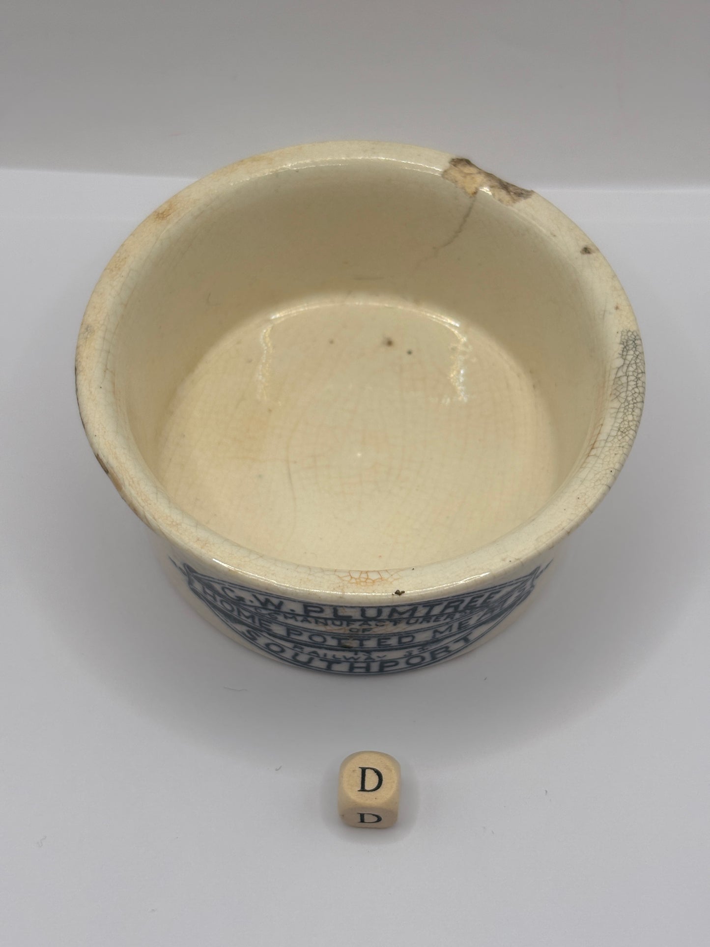 Old advertising meat paste pot, plumtrees (D) damaged