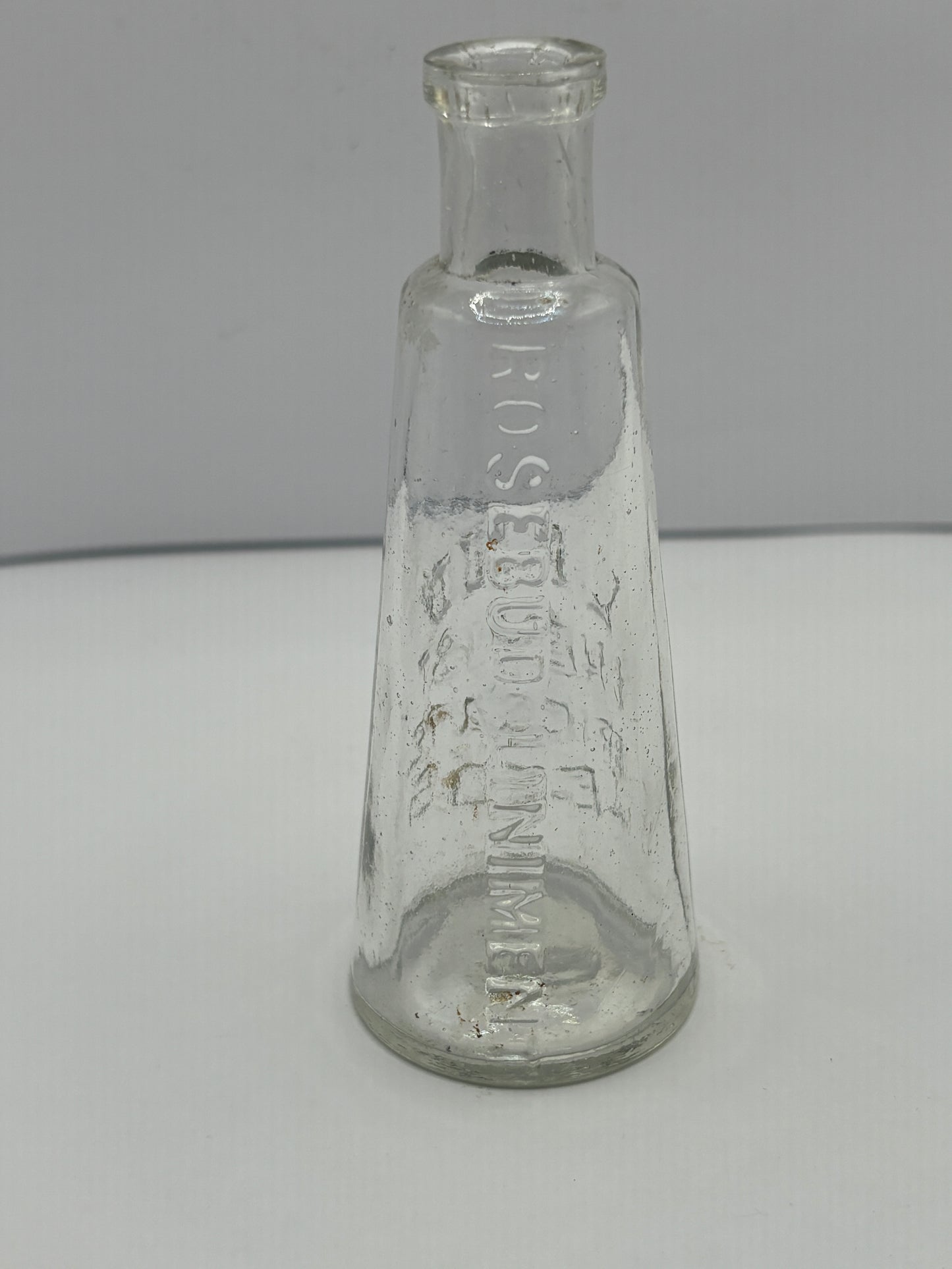 Old Leeds Rosebud liniment advertising bottle, Land chemist Briggate Leeds