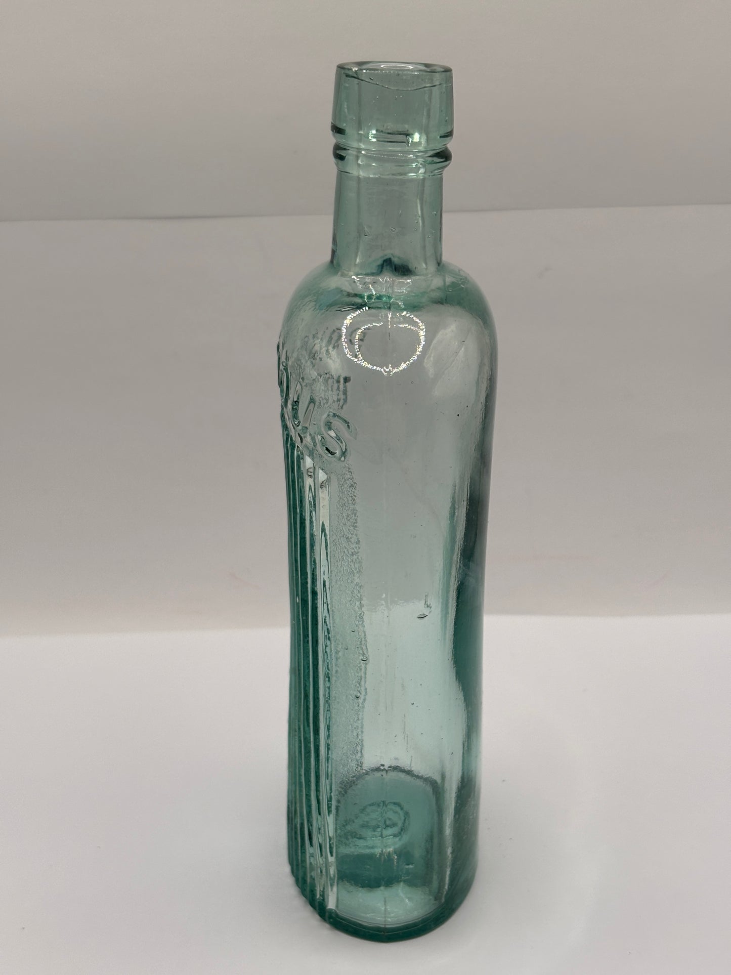 Old aqua glass poison bottle, Poisonous not to be taken