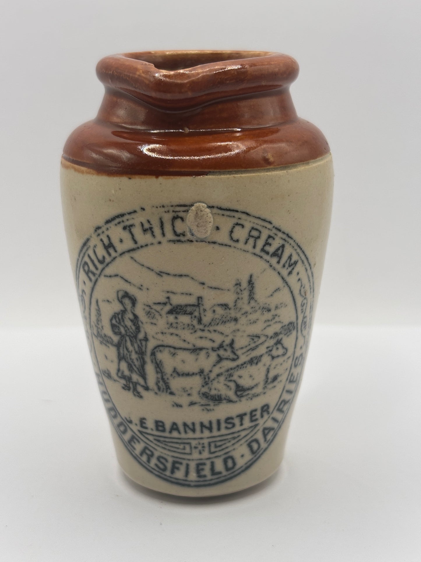 Old advertising cream pot, Peter Warner. Bannisters Huddersfield dairies. Rich thick cream