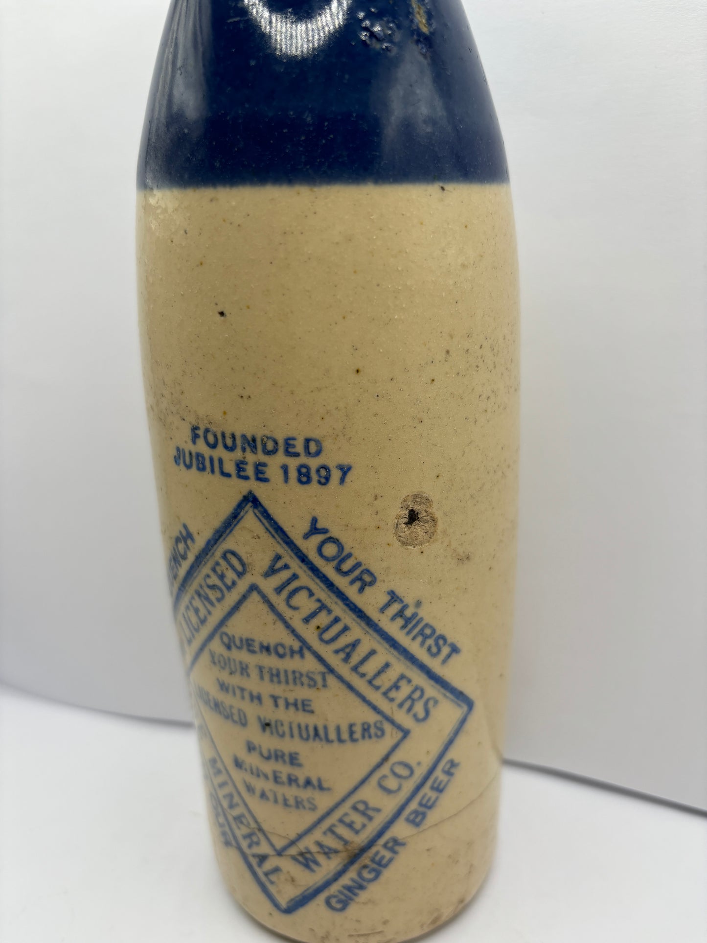 Old blue top ginger beer bottle