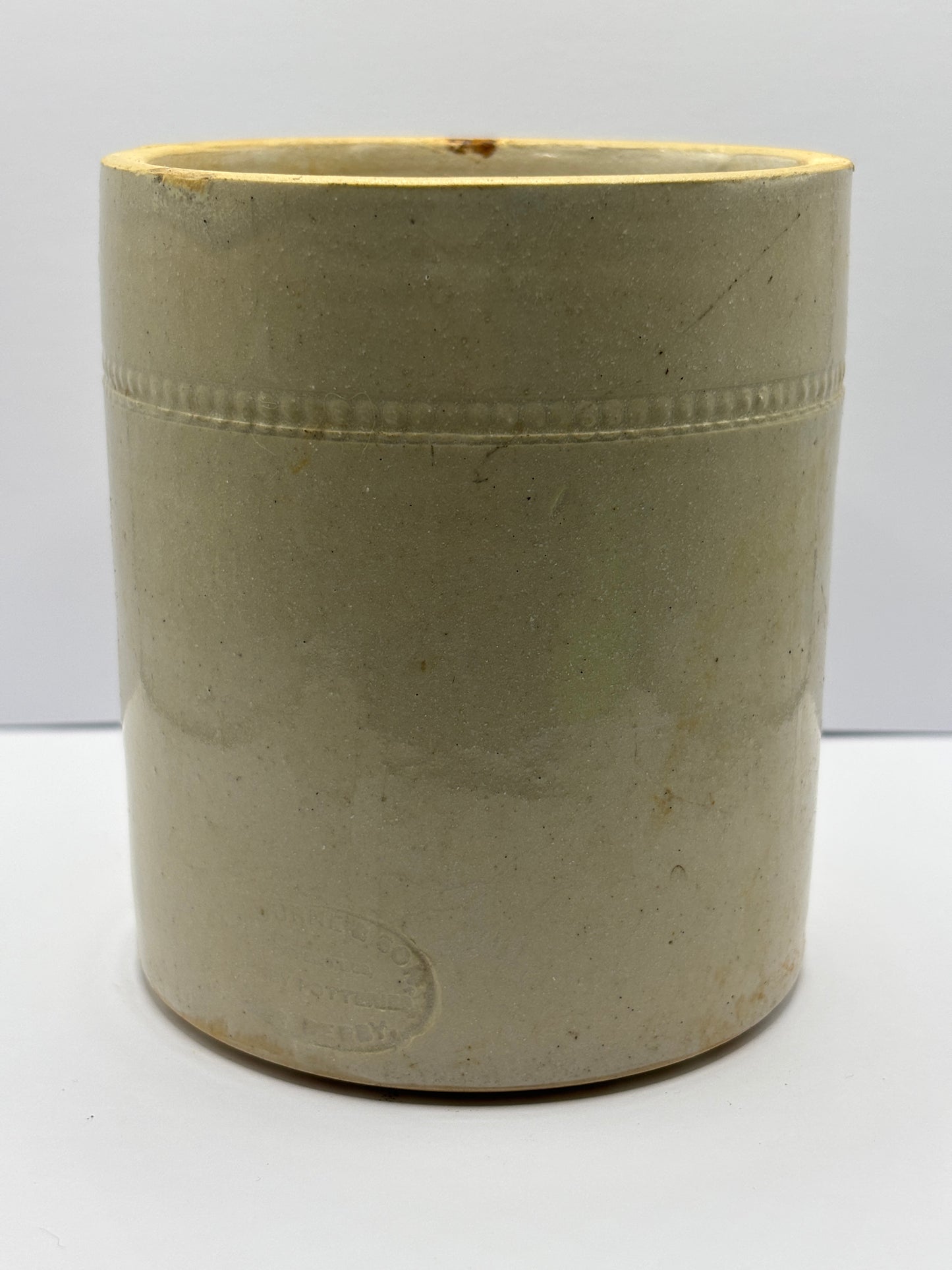 Old white stoneware jar