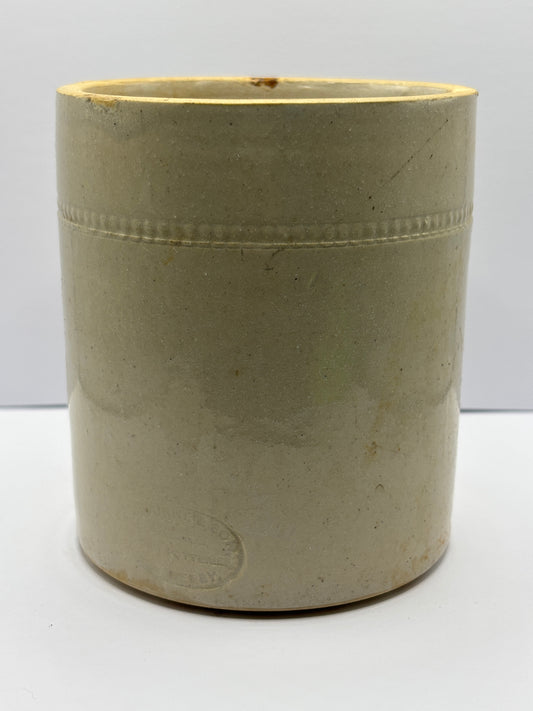 Old white stoneware jar
