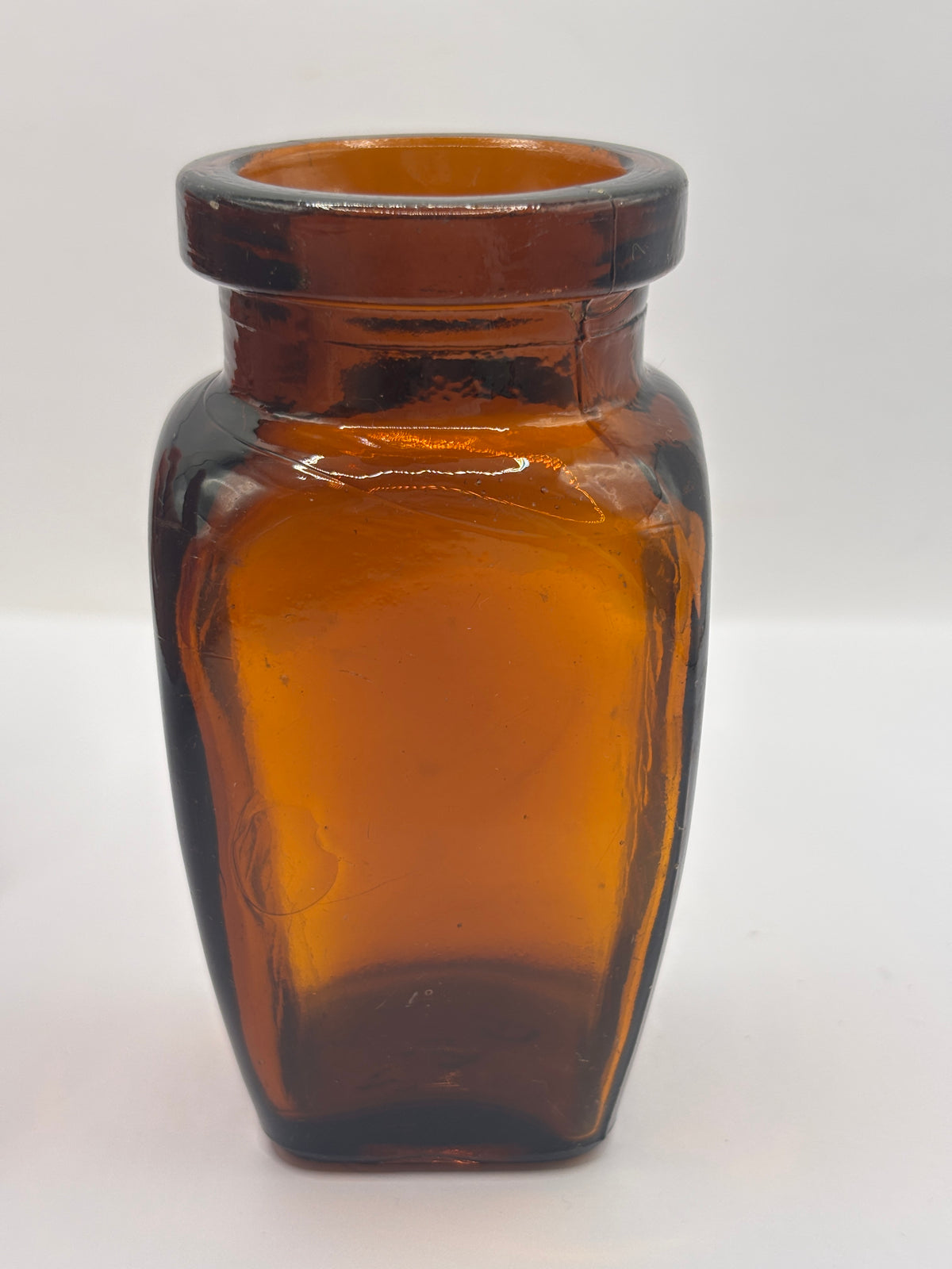 Old amber glass Virolax jar