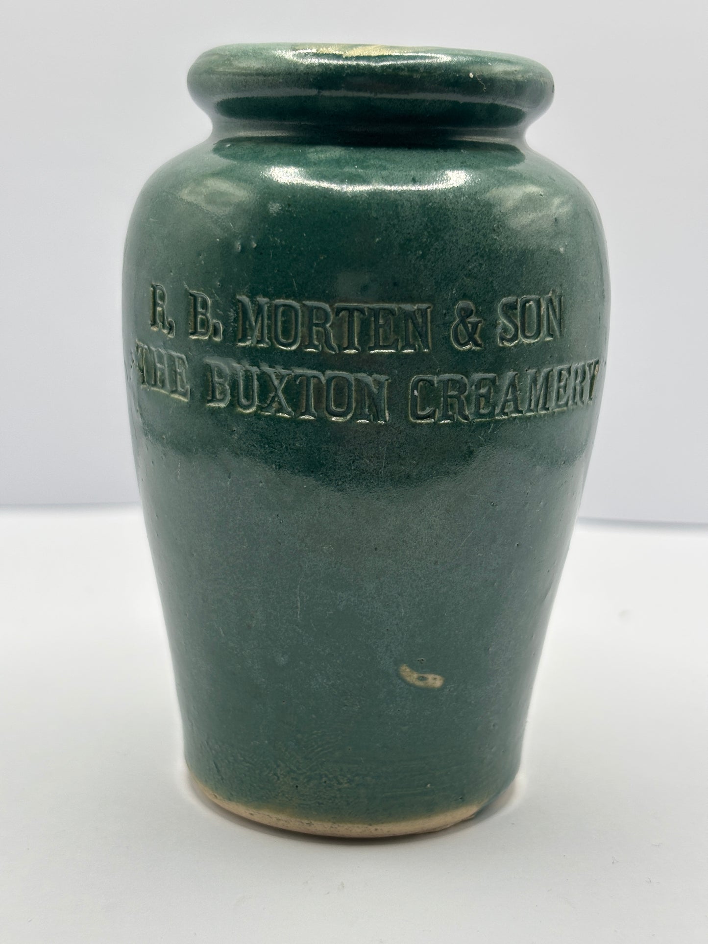 Old green stoneware cream pot. The Buxton creamery, R.B Morten & son