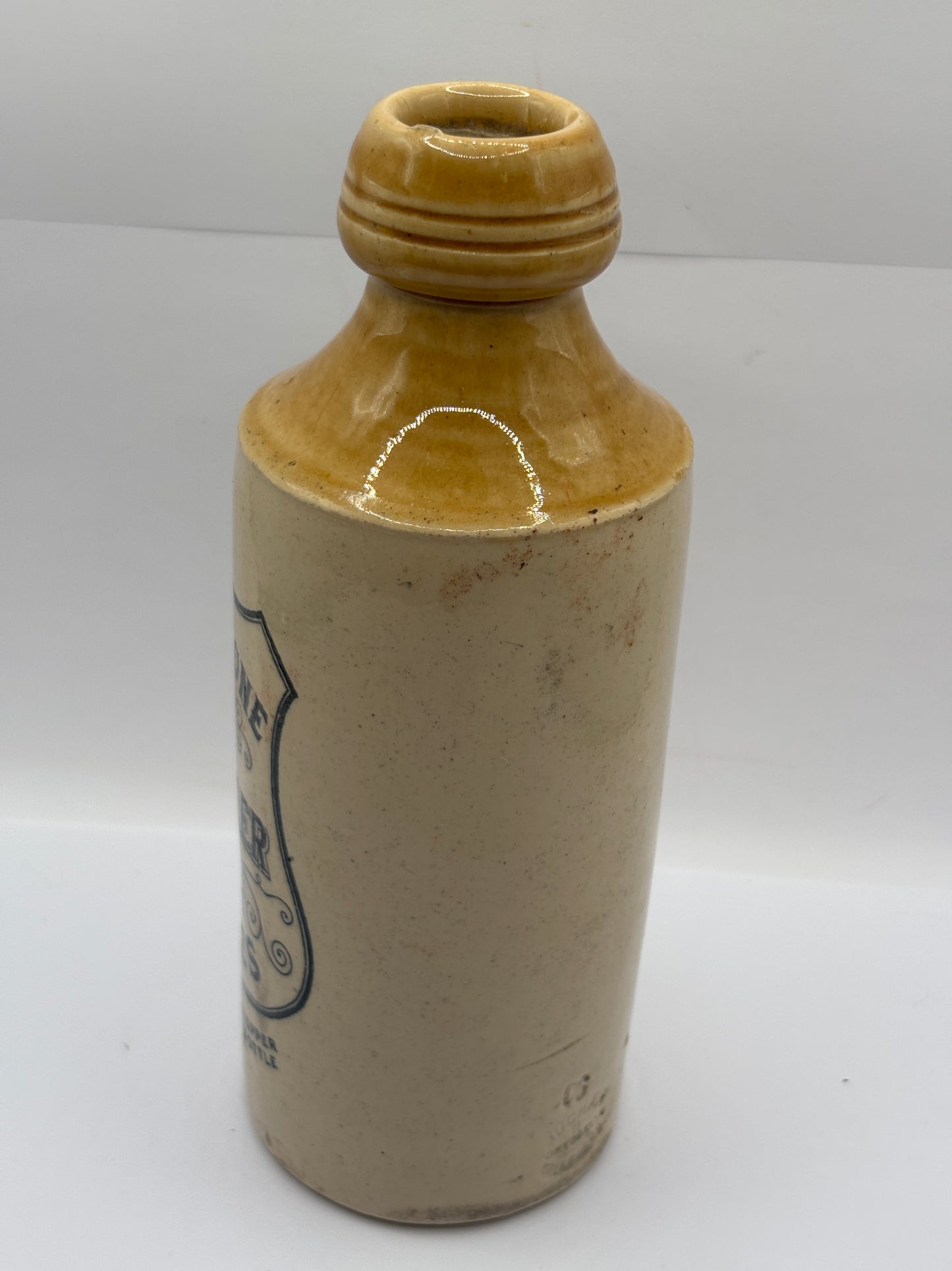 Old stoneware ginger beer bottle, W.G Johnstone chemists Dumfries