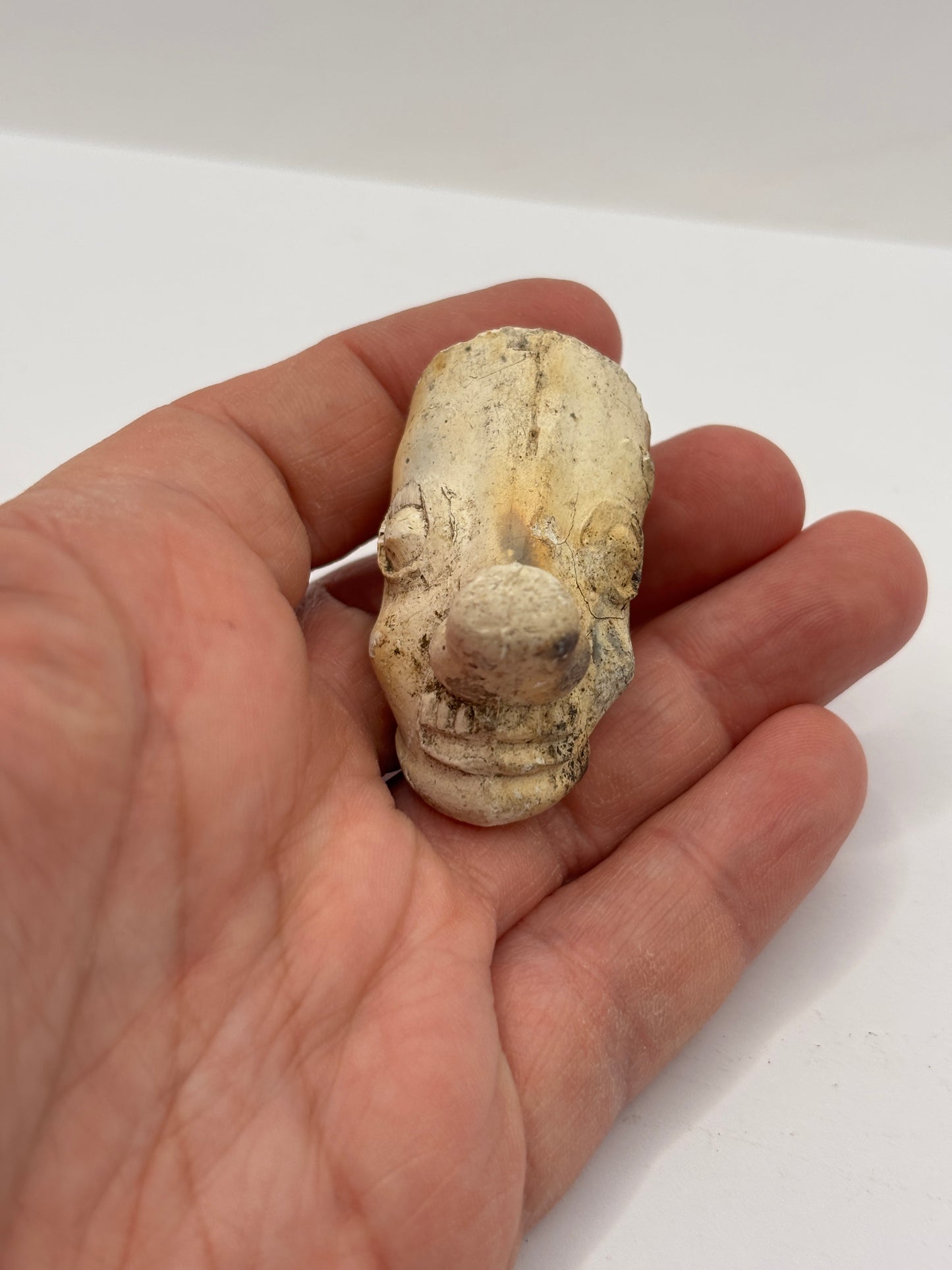 Old figural clay pipe head, pipe bowl. Ally sloper