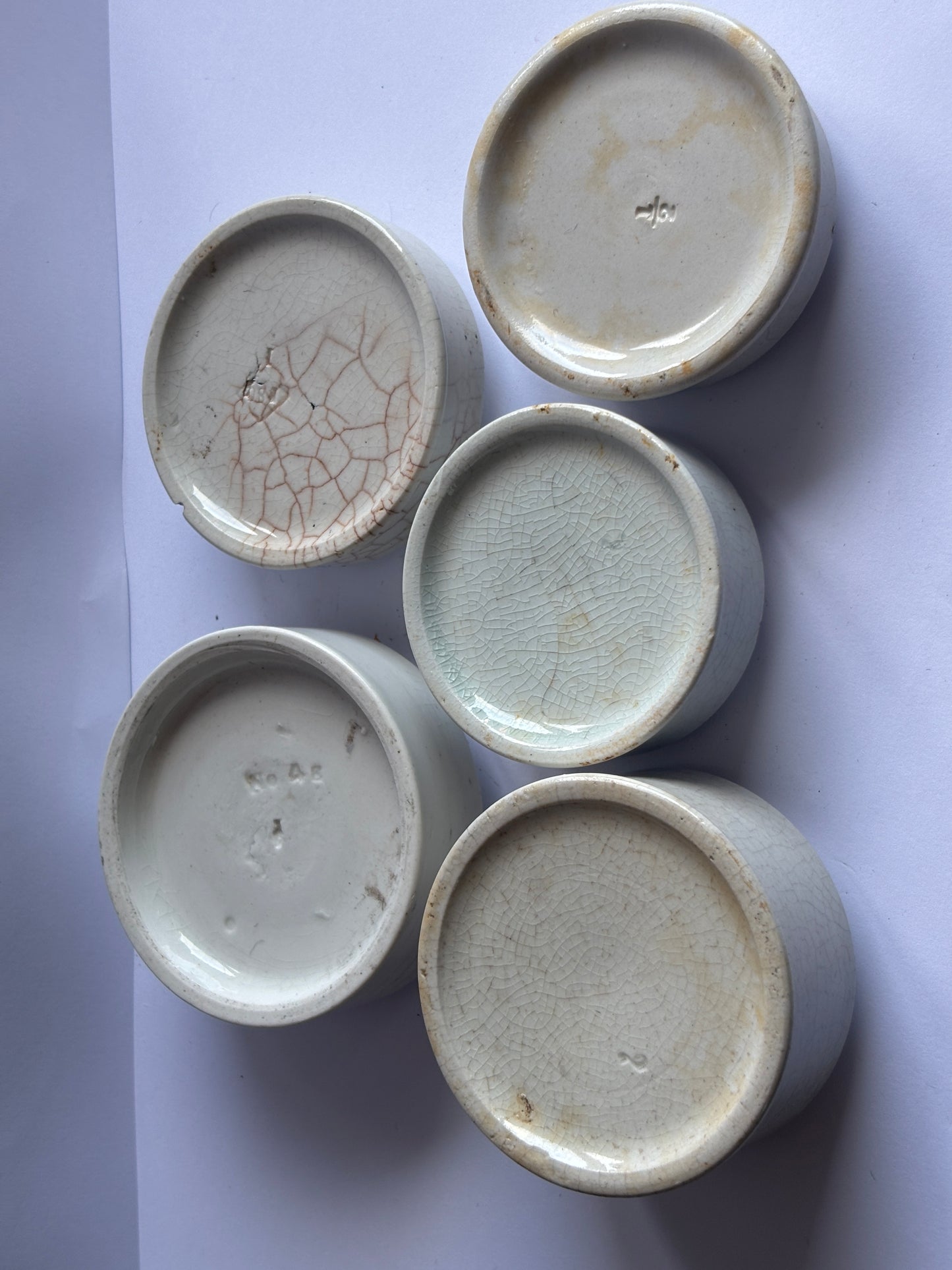 5 old pot lid bases, stackers, risers