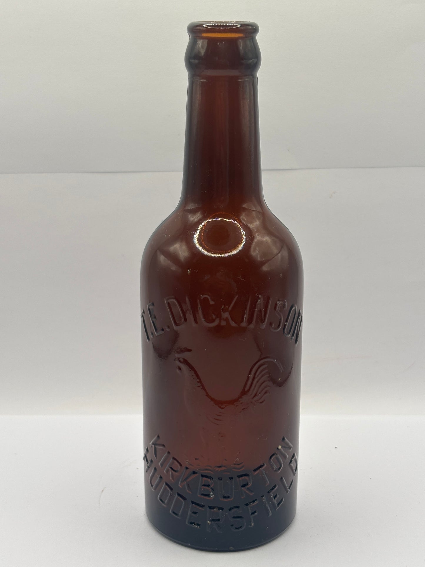 Old advertising glass beer bottle, Huddersfield