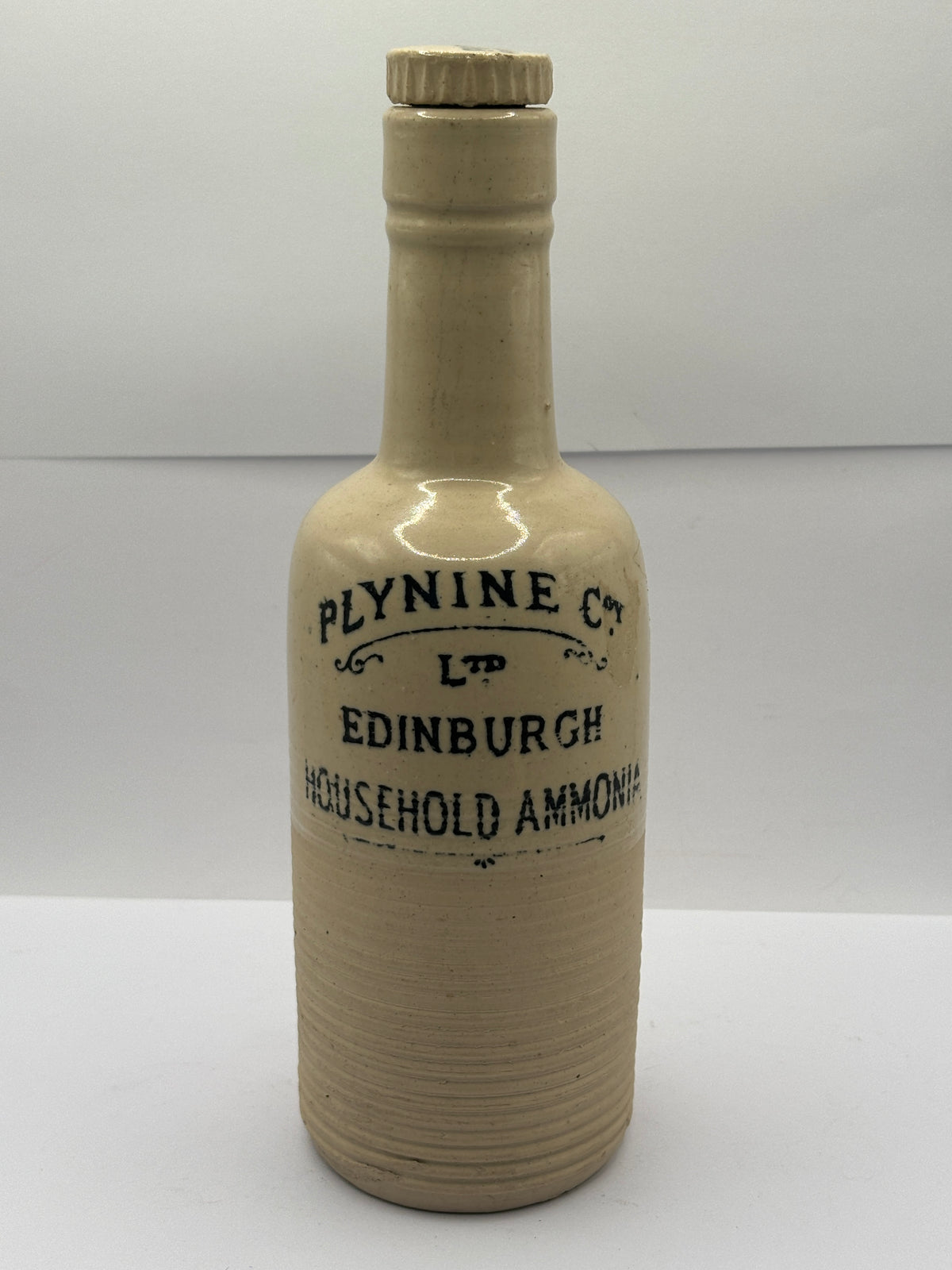 Old stoneware advertising bottle, Plynine household Ammonia with original stopper