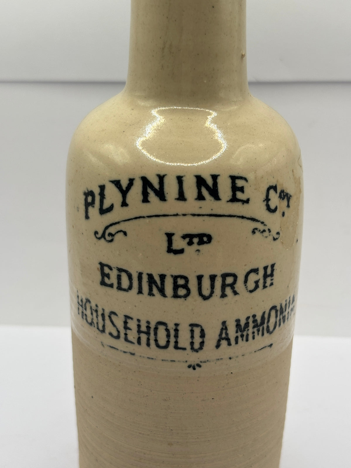 Old stoneware advertising bottle, Plynine household Ammonia with original stopper