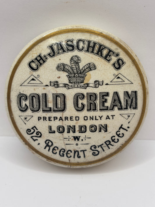 Old advertising lid, CH Jaschkes cold cream. Damaged/repaired