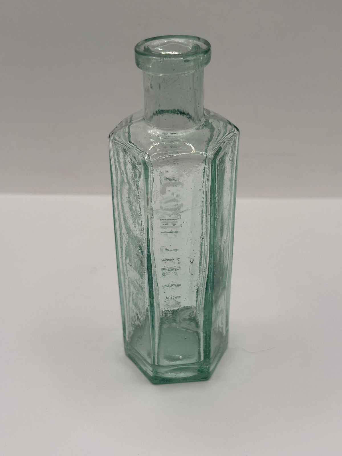 Old aqua glass poison bottle, Not to be taken