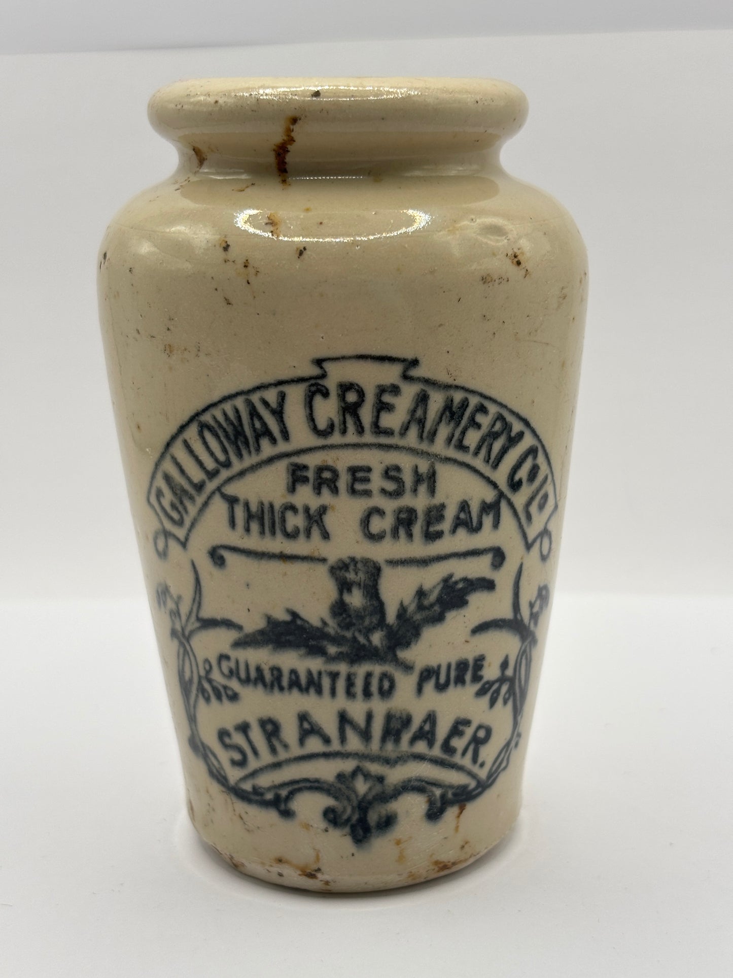 Old advertising cream pot, Galloway creamery Stranraer. Damaged