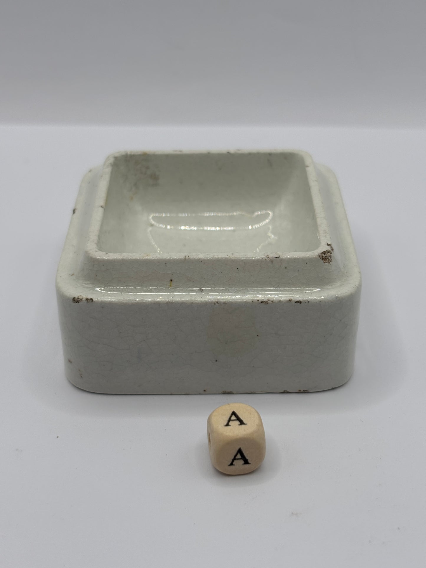 Old square pot lid base, stacker (A)
