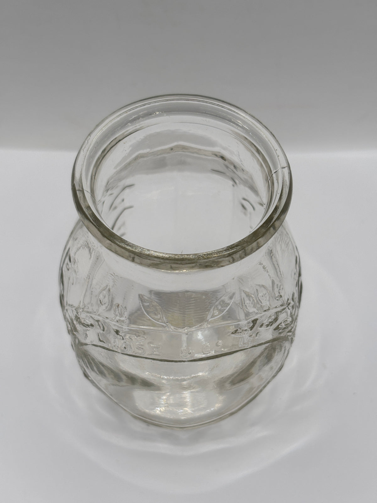 Old clear glass Roses marmalade jar