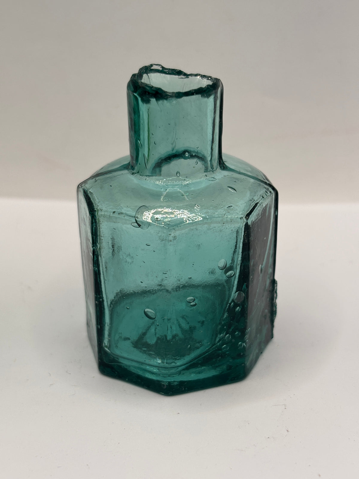 Old dark aqua glass inkwell, ink bottle, penny ink