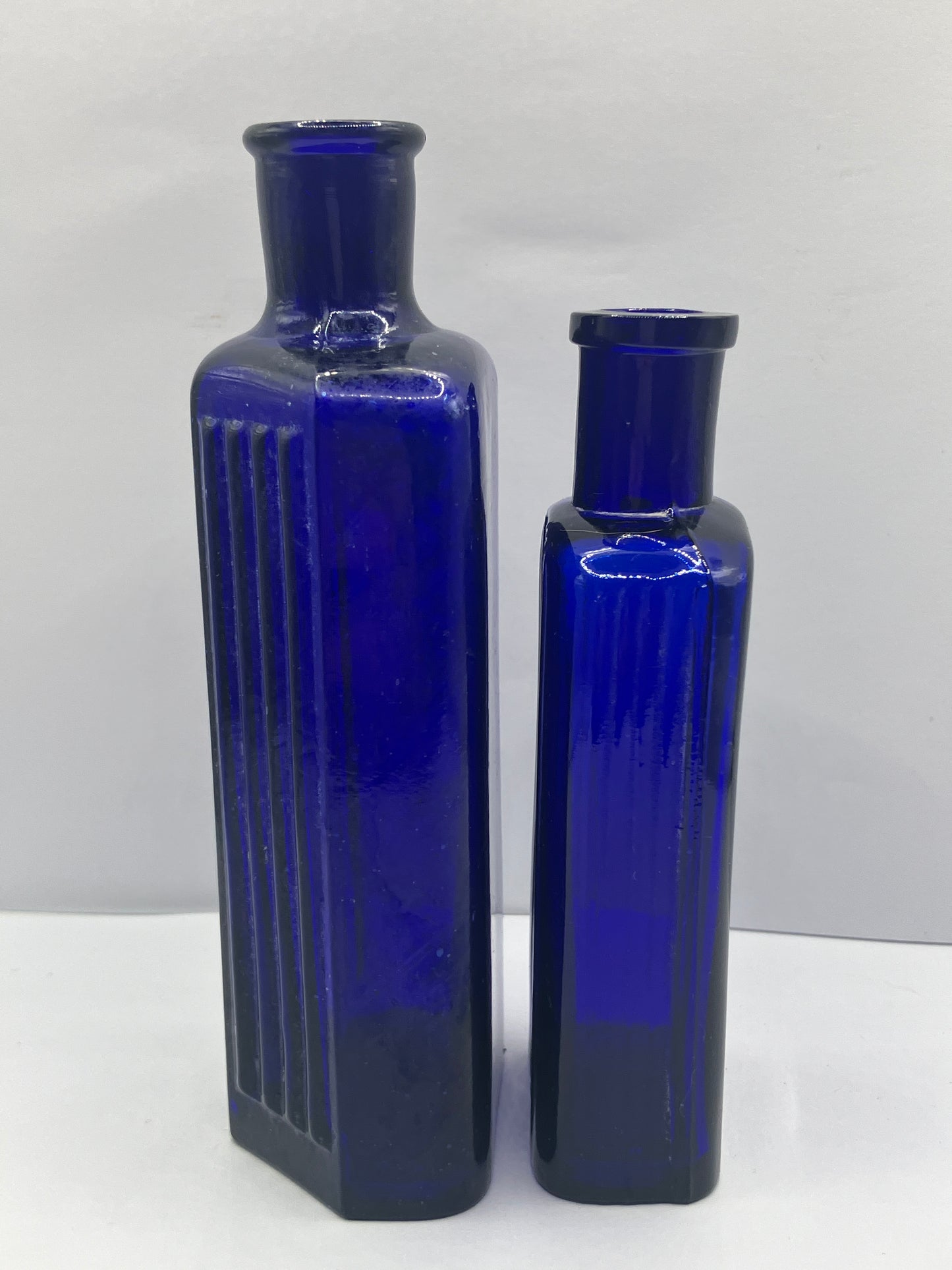 2 blue ribbed poison bottles, Not to be taken