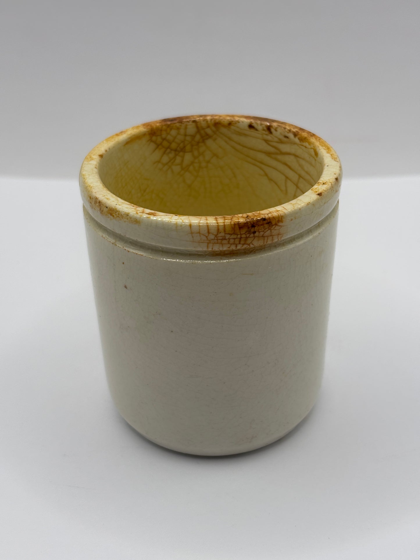 Old white stoneware jar